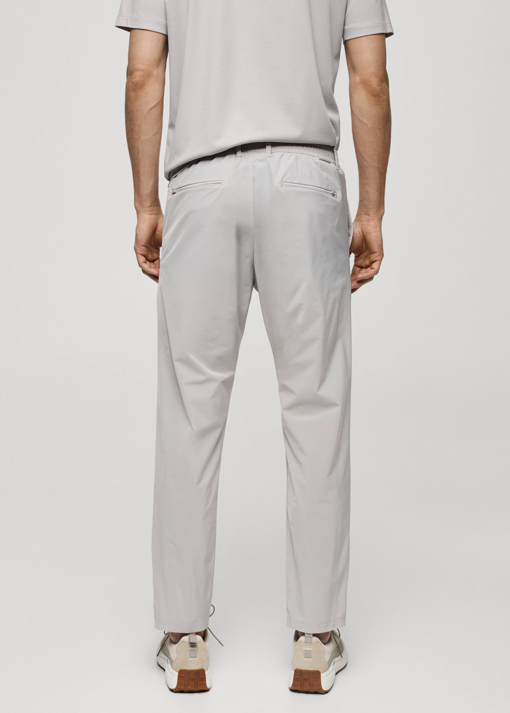 Wasserabweisende Hose mit Kordel - Rückseite des Artikels