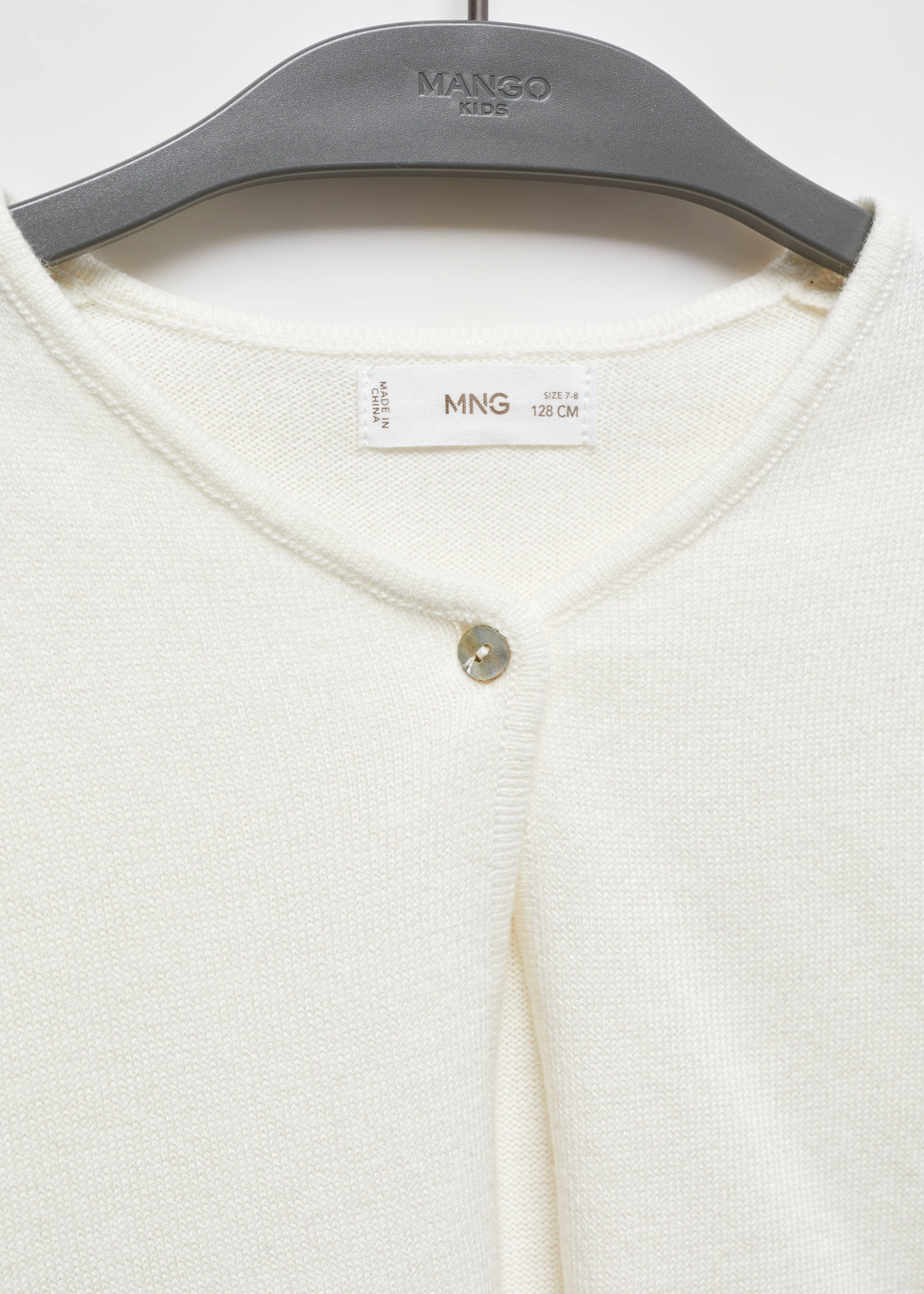 Feinstrick-Cardigan aus Baumwolle - Detail des Artikels 8, Cremeweiß. Ref: 67063690-00.