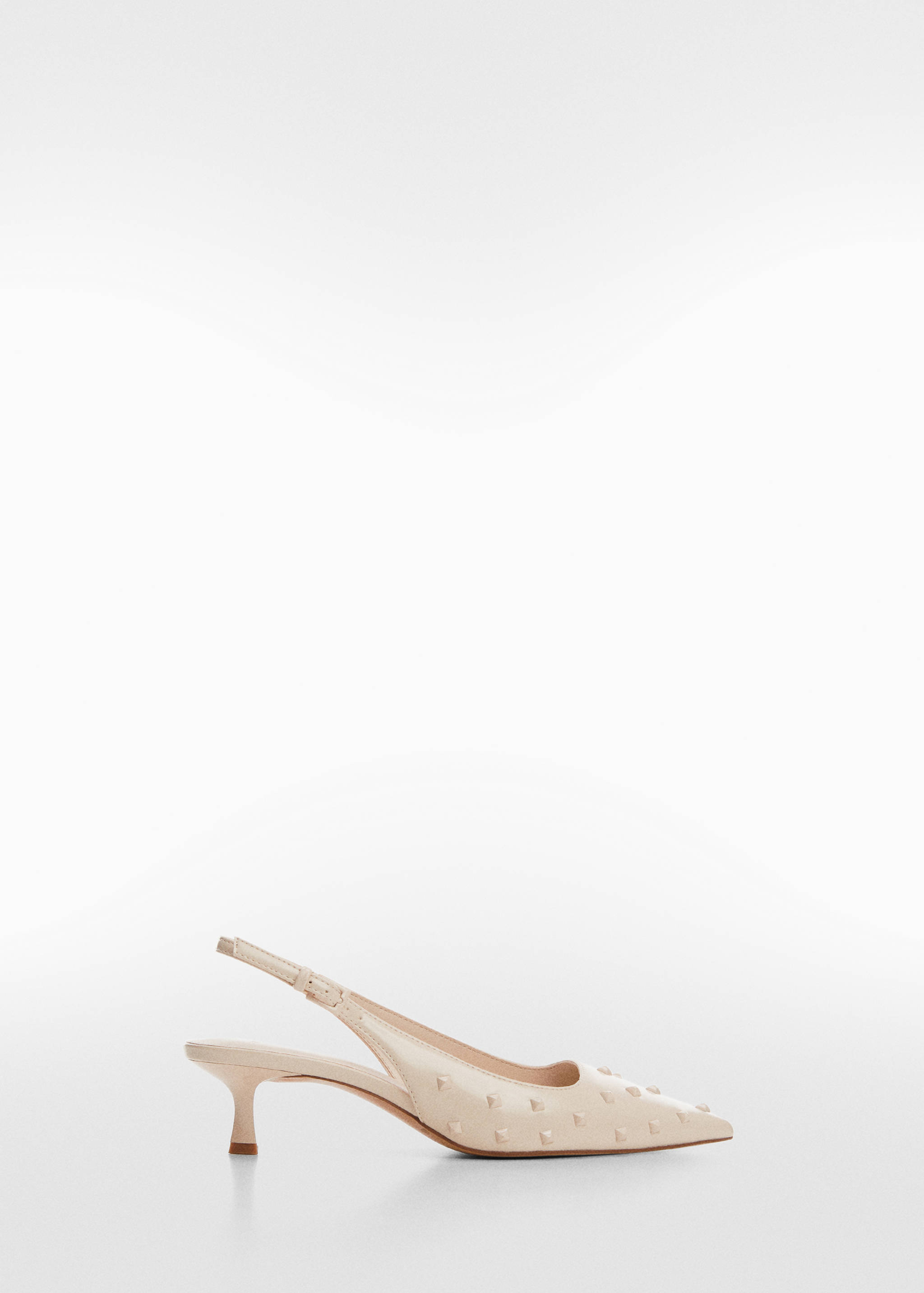 Chaussures cloutées ouvertes à l’arrière - Article sans modèle