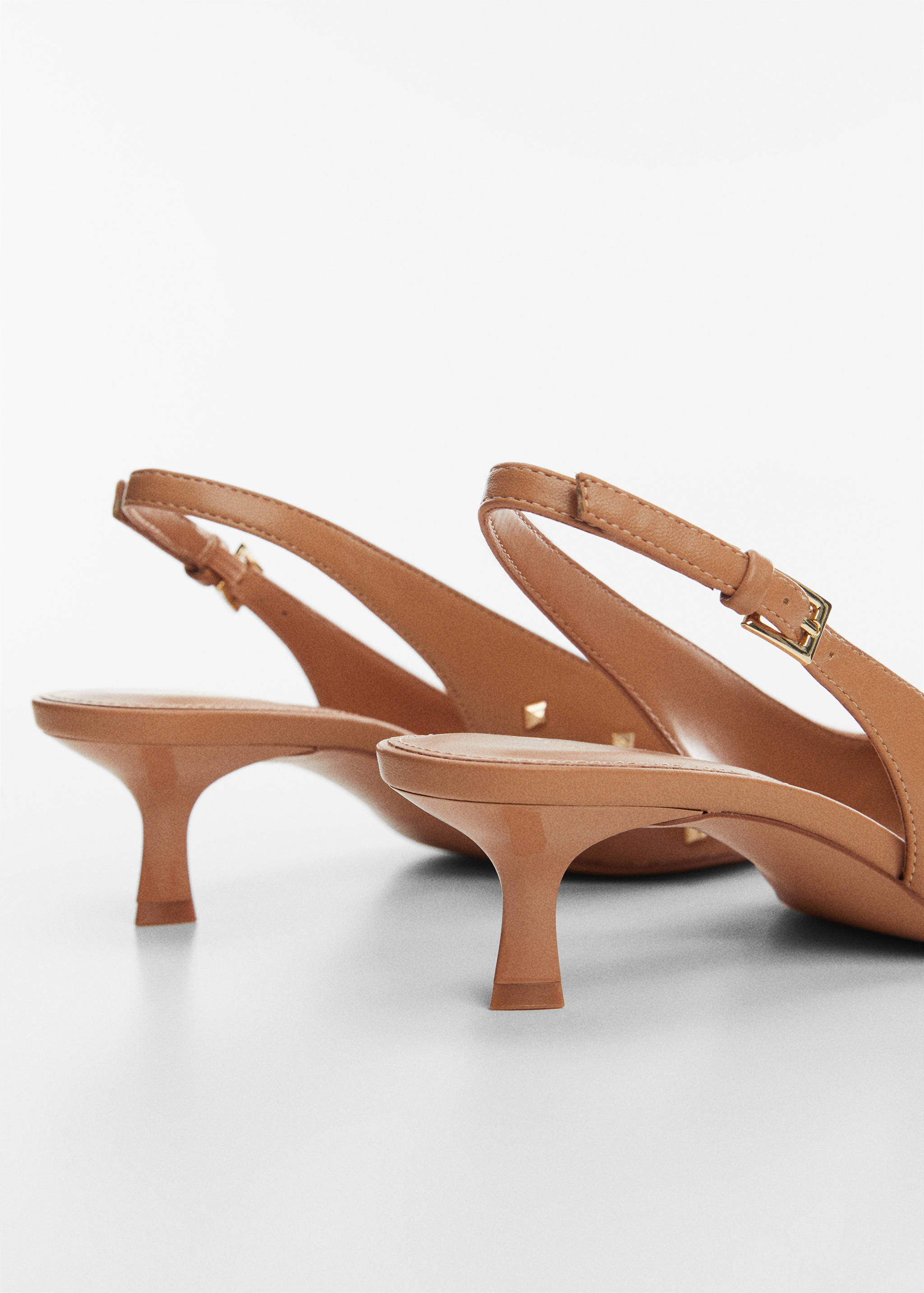 Chaussures cloutées ouvertes à l’arrière - Détail de l'article 1