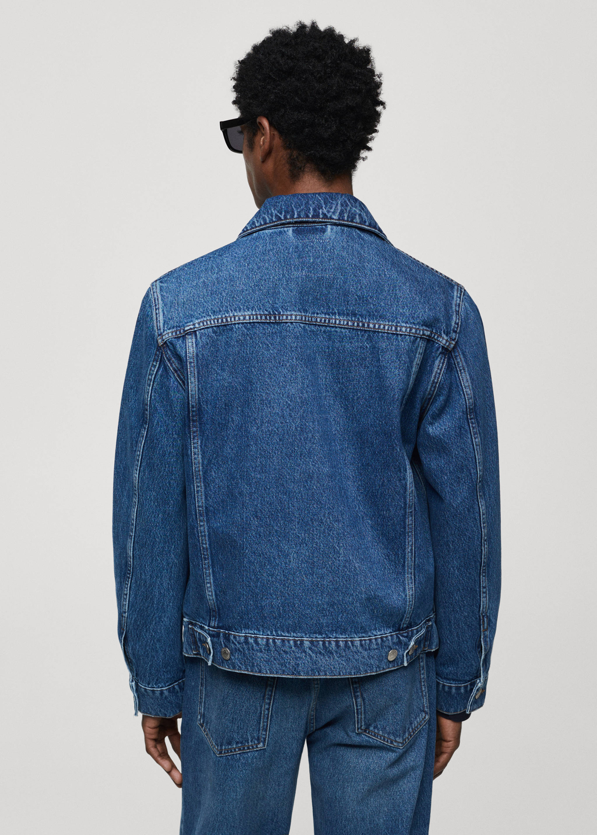 Pocketed denim jacket - Reverse of the article