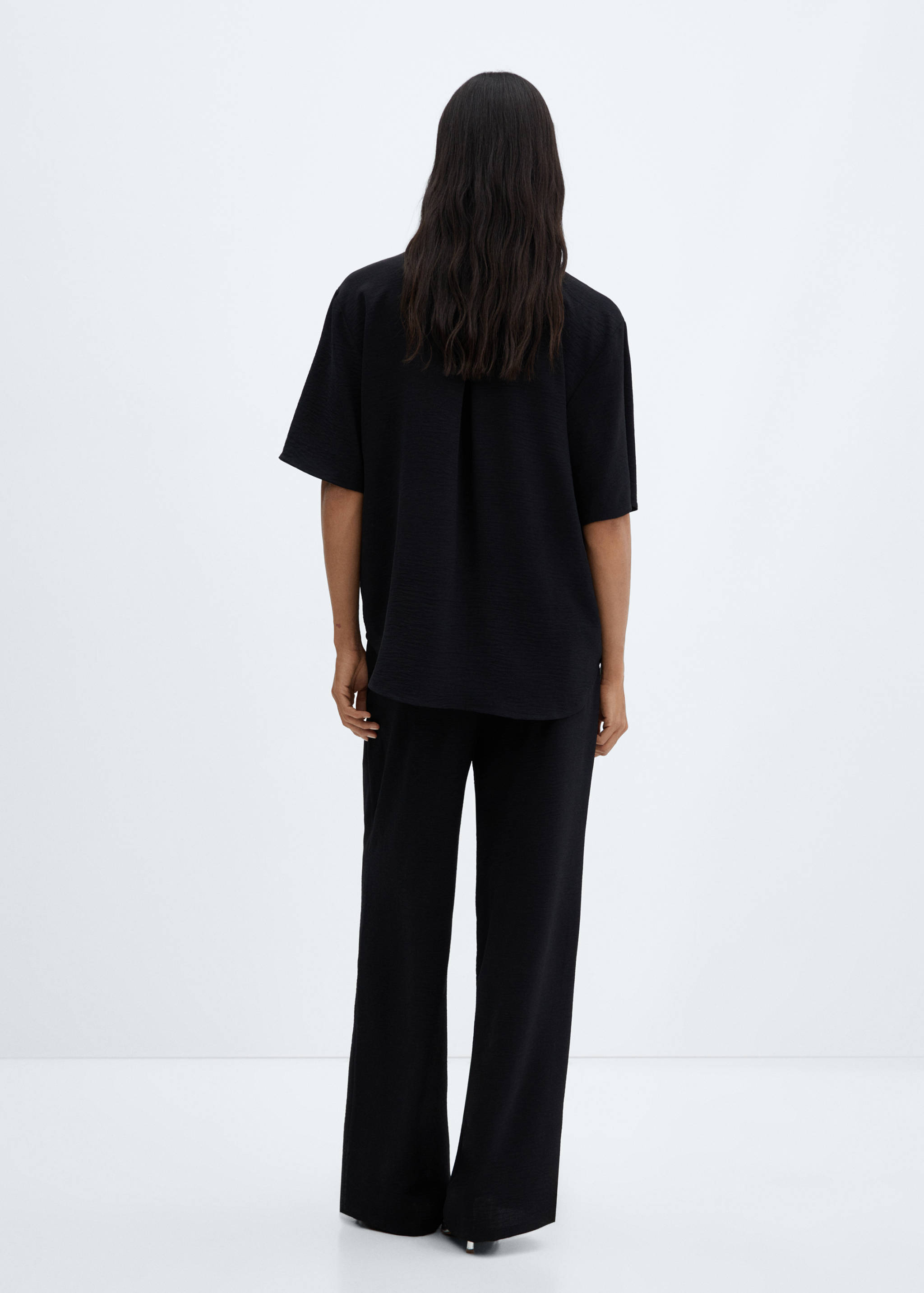 Short-sleeve button-down shirt - Reverse of the article