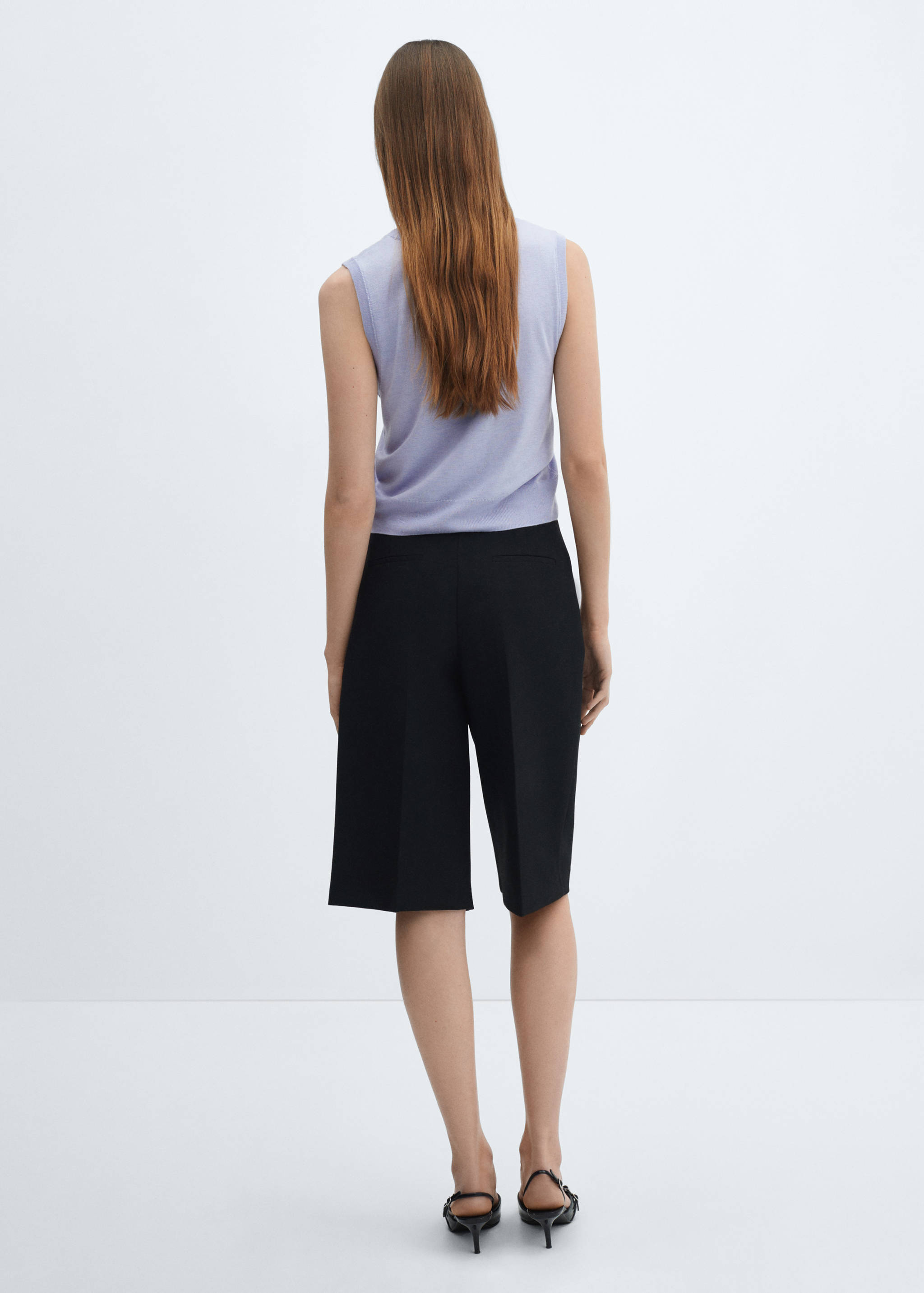 Knitted gilet with buttons - Reverse of the article