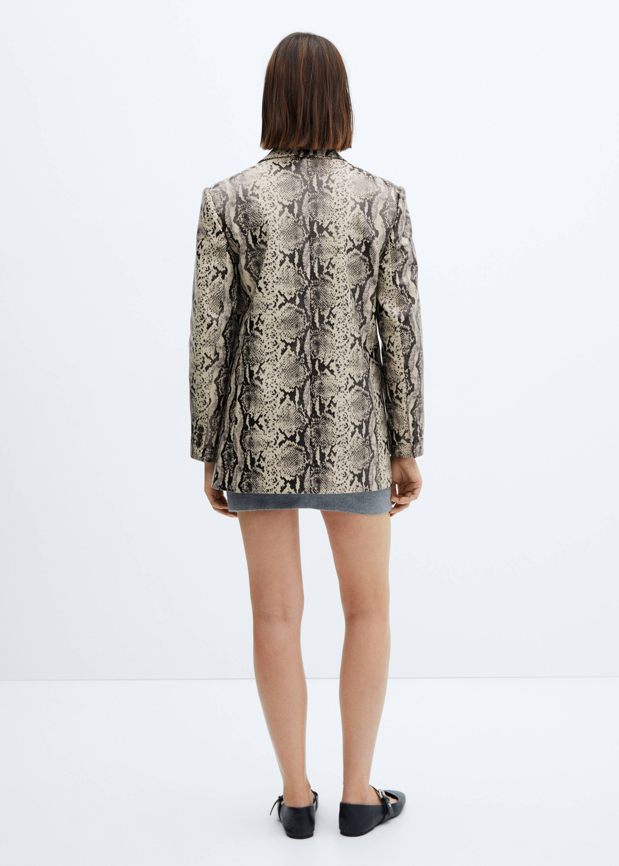 Veste imitation serpent - Verso de l’article