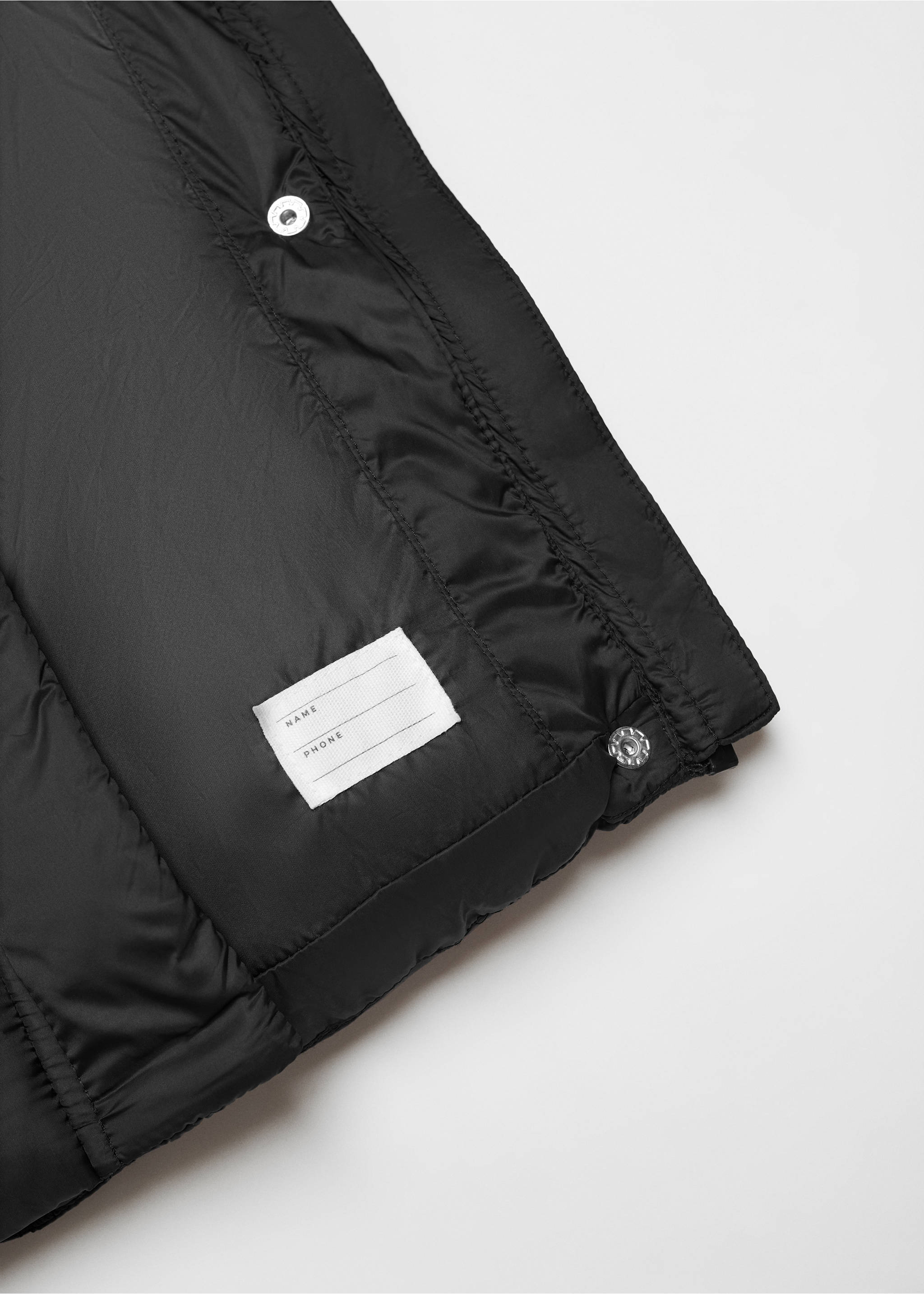 Steppweste mit Kapuze - Detail des Artikels 8, Schwarz. Ref: 67071505-00.