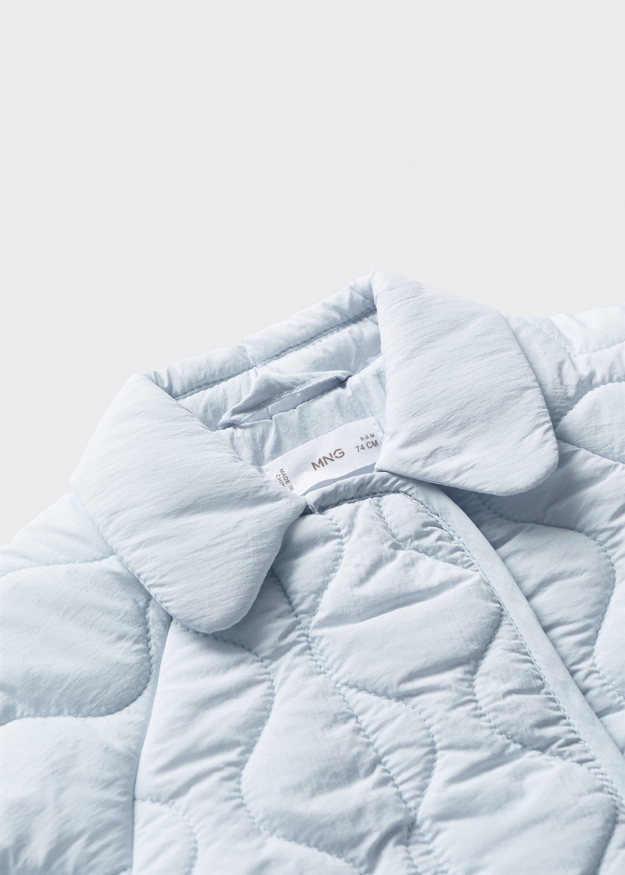 Jaqueta embuatada impermeable rombes - Detall de l'article 0