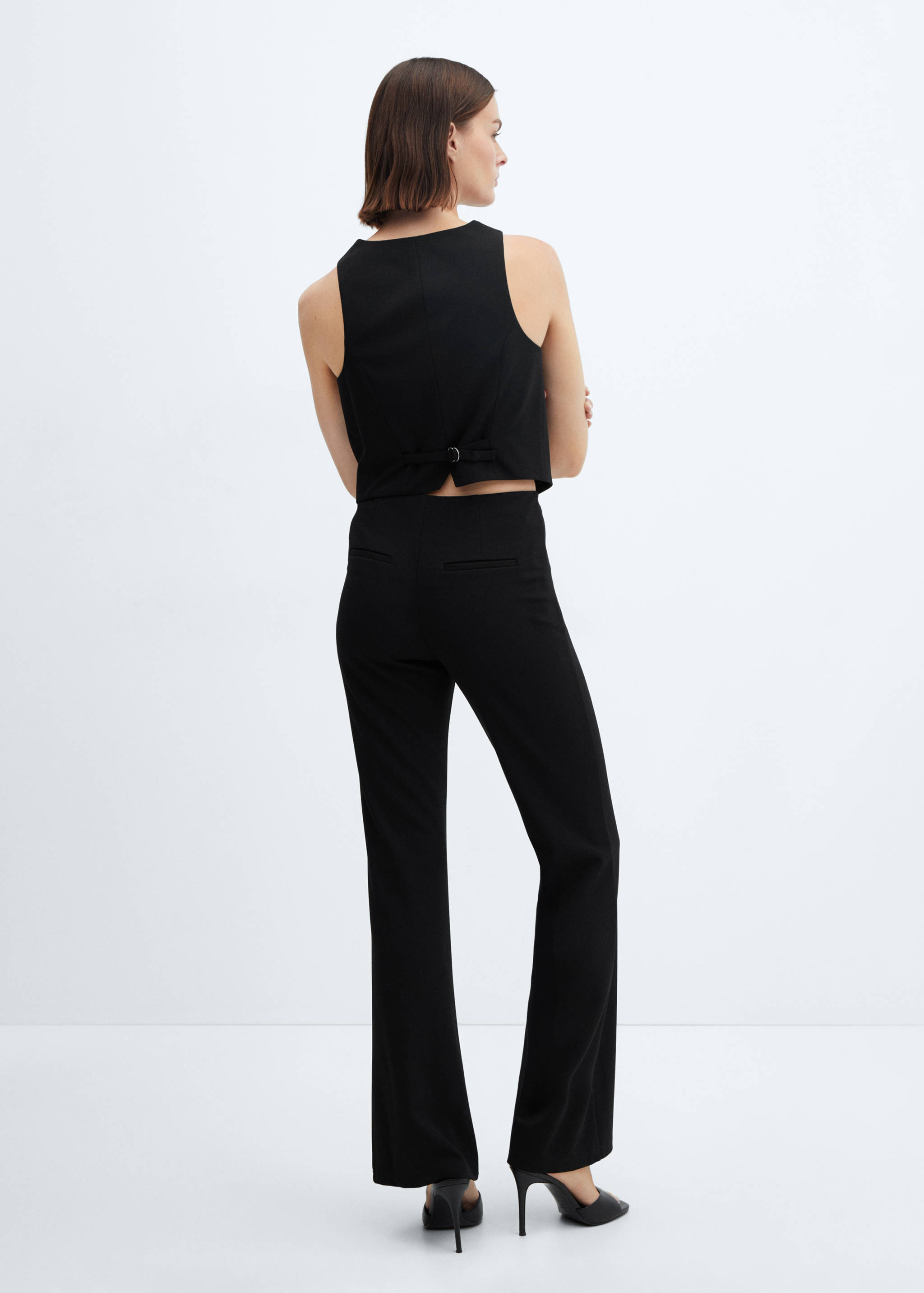 Väst med knappar - Artikelns baksida