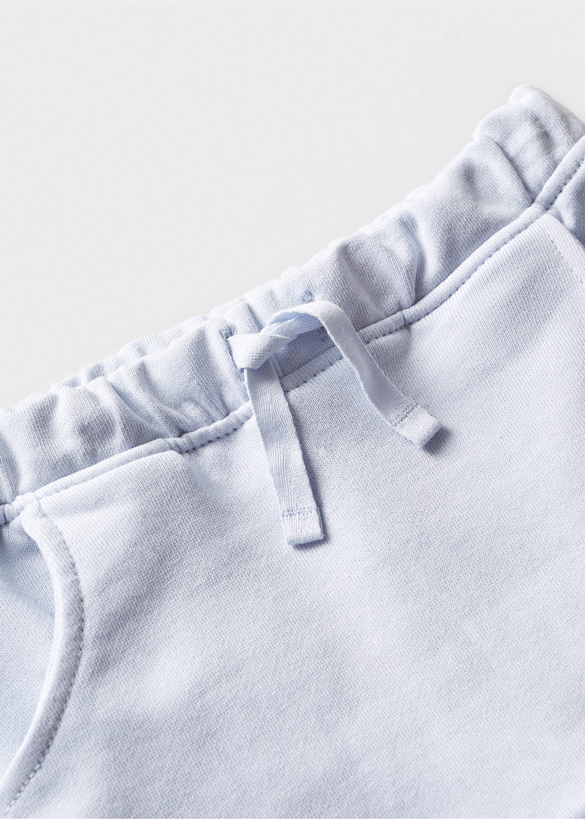 Cotton jogger-style trousers - Details of the article 0, Sky Blue. Ref: 67074019-00.
