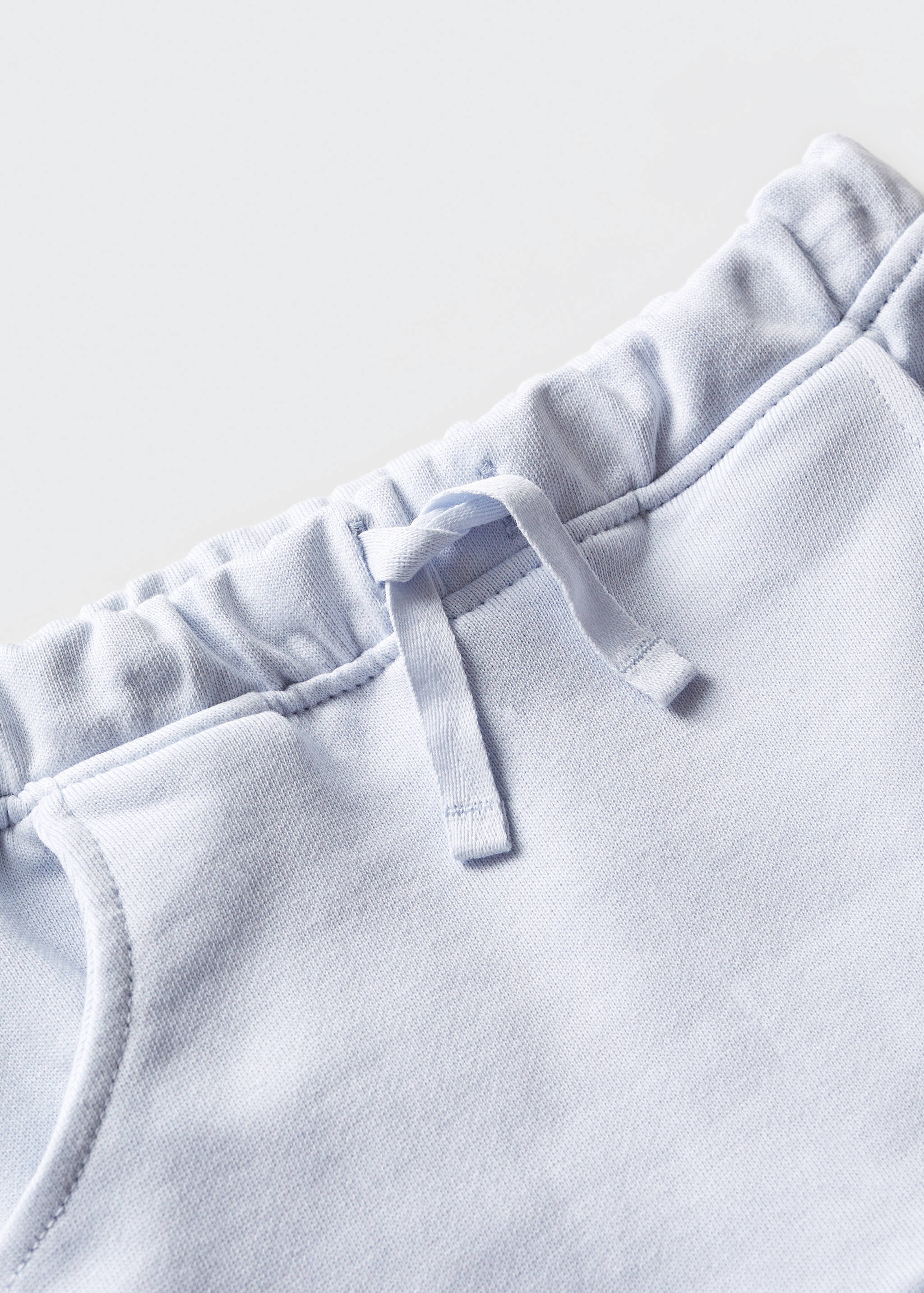 Cotton jogger-style trousers - Details of the article 0