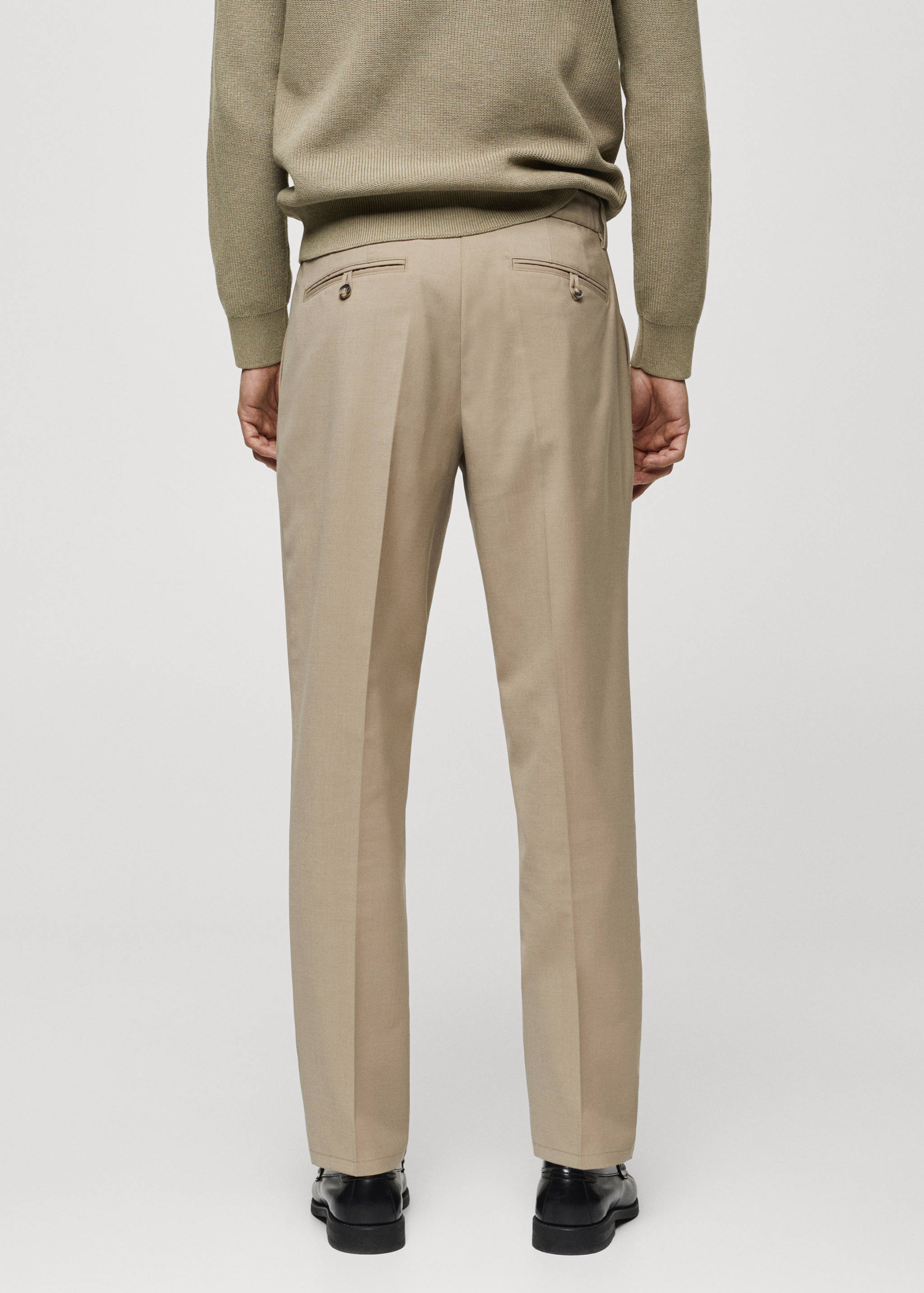 Cold wool trousers with pleat detail - Reverse of the article