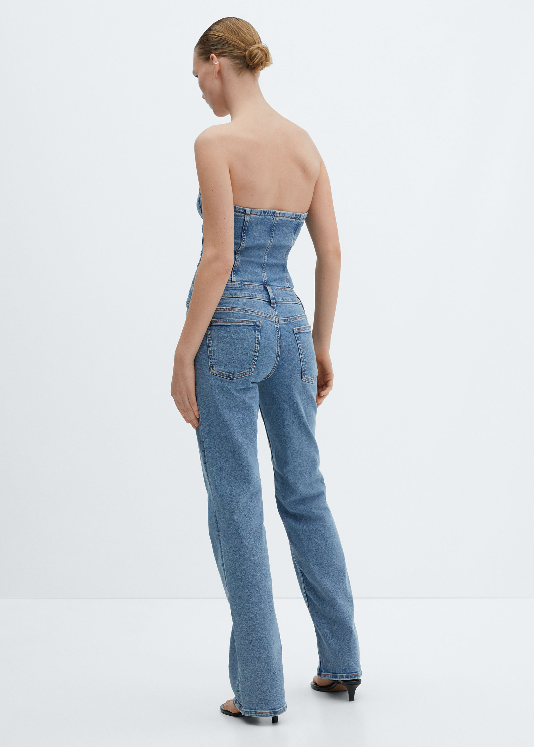 Schulterfreier Jeans-Jumpsuit - Rückseite des Artikels