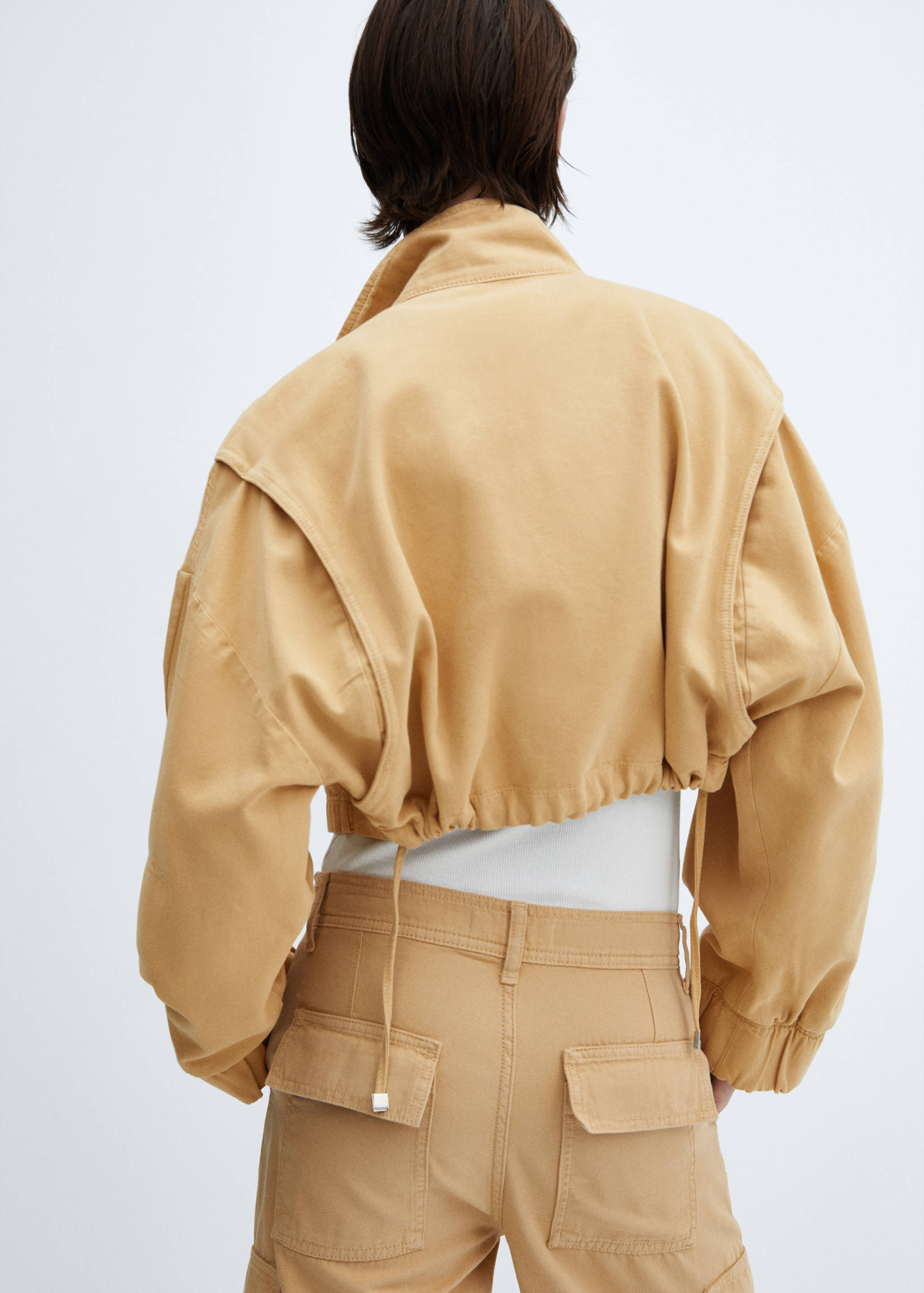 Cropped jacket with pockets - Reverse of the article