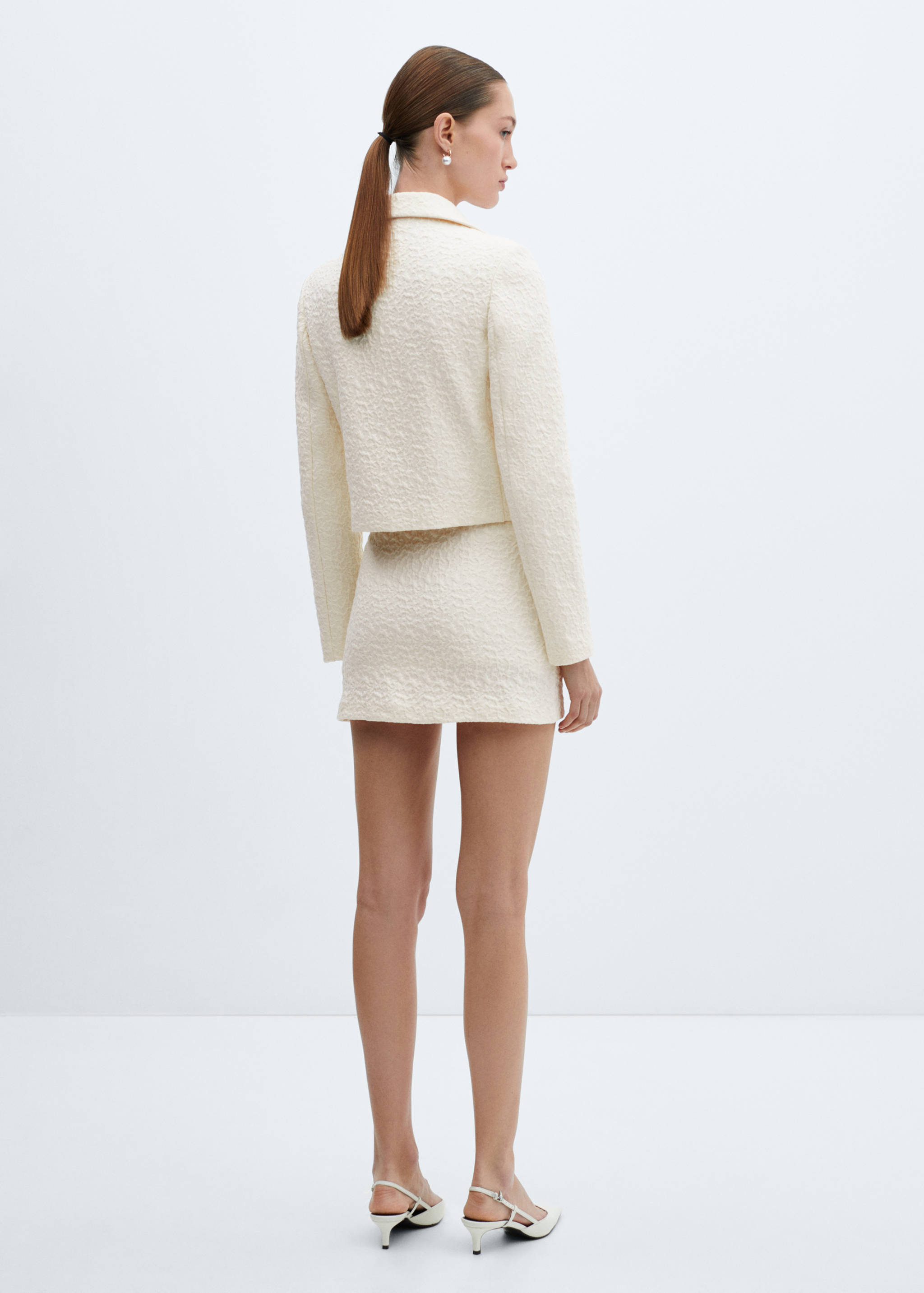 Texturerad bomull kjol - Artikelns baksida