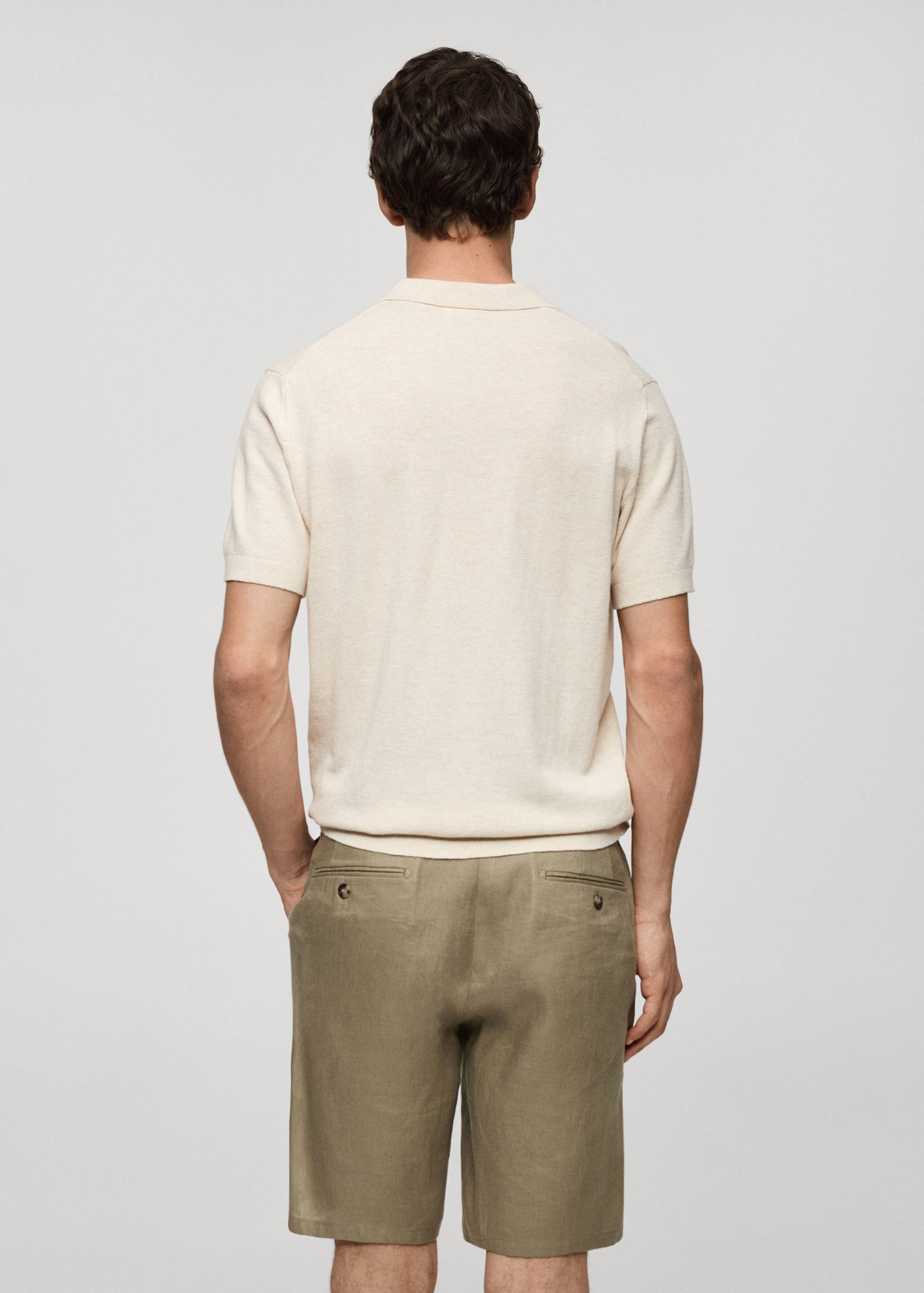 Polo punto manga corta - Reverso del artículo