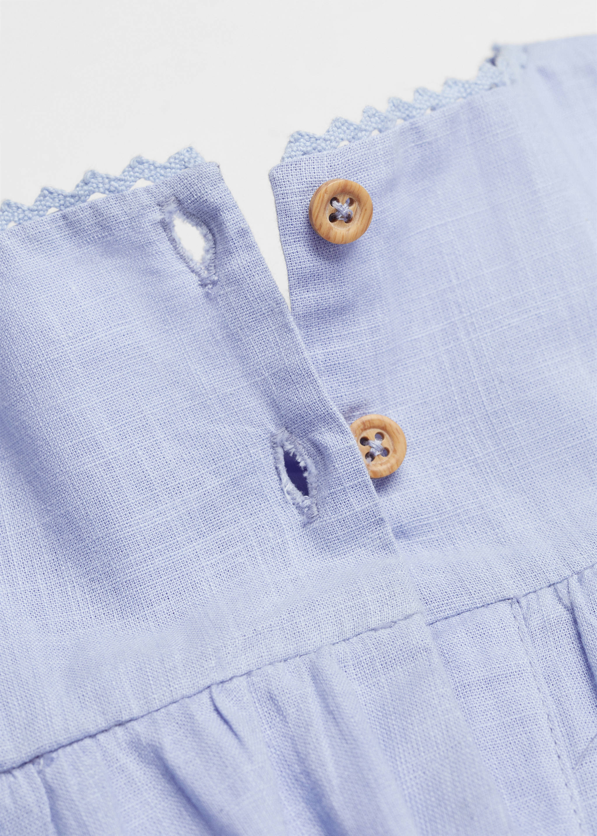 Kleid mit Lochmuster - Detail des Artikels 0