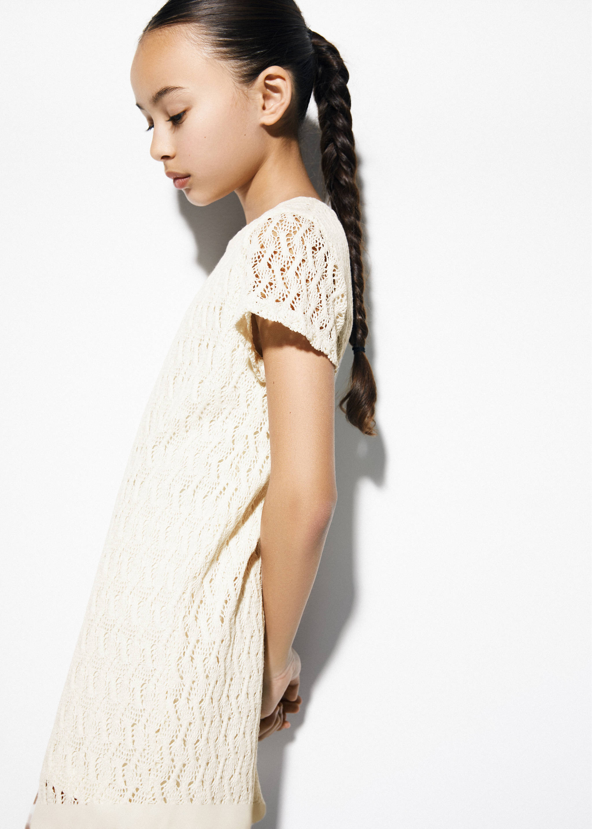 Knitted dress with lace pattern - Medium plane