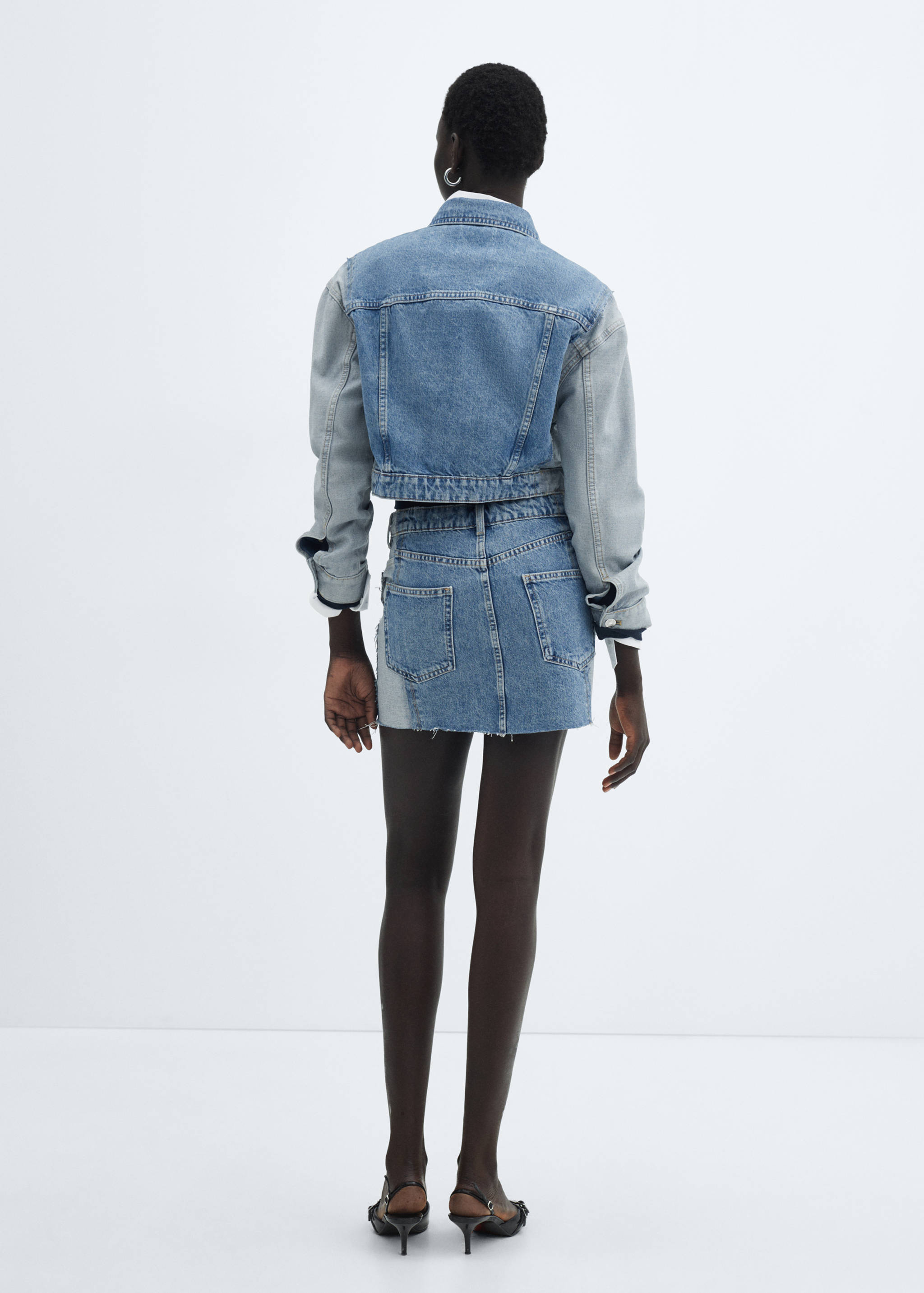 Two-tone denim mini-skirt - Reverse of the article