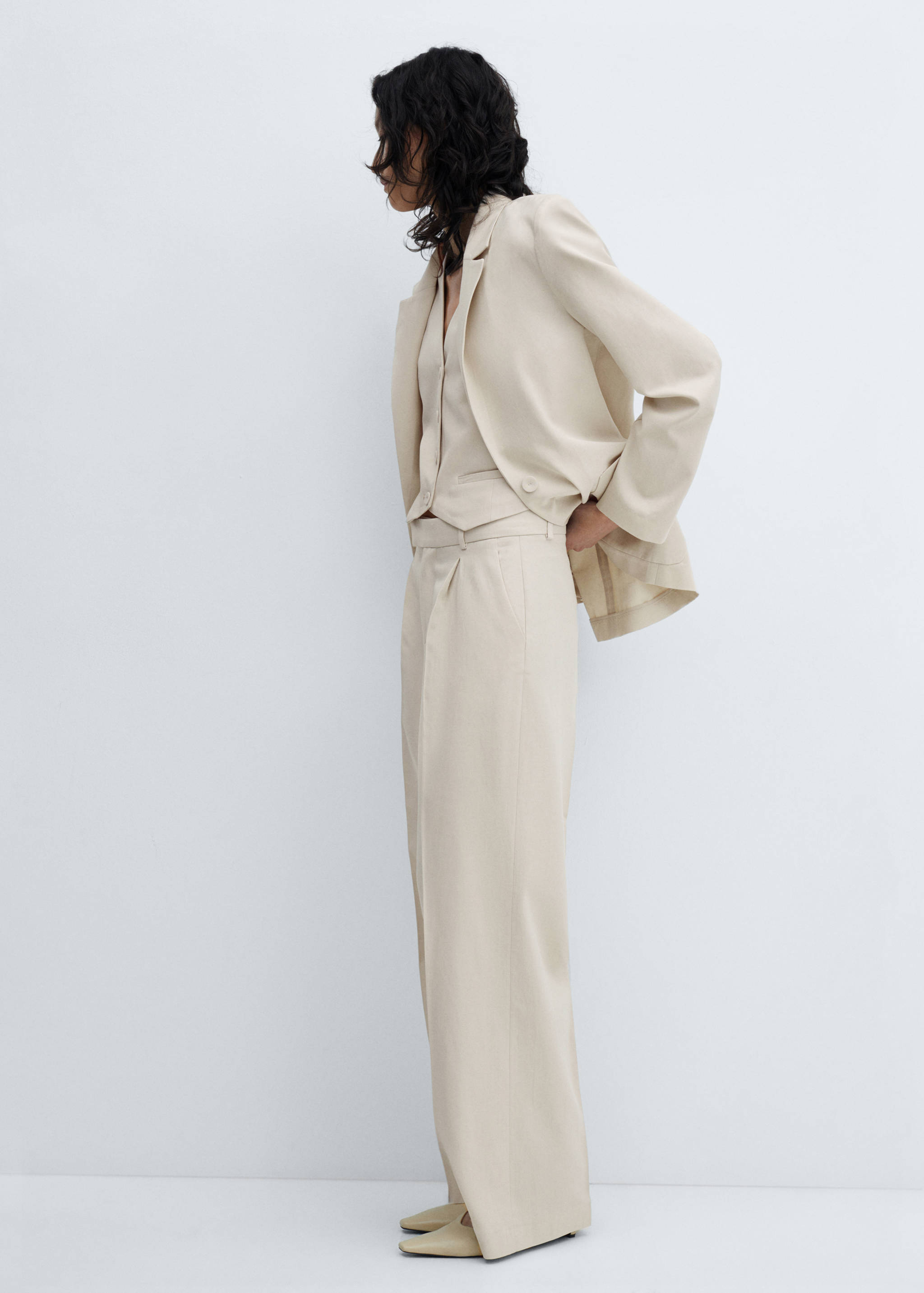 Bandplooibroek - Detail van het artikel 2