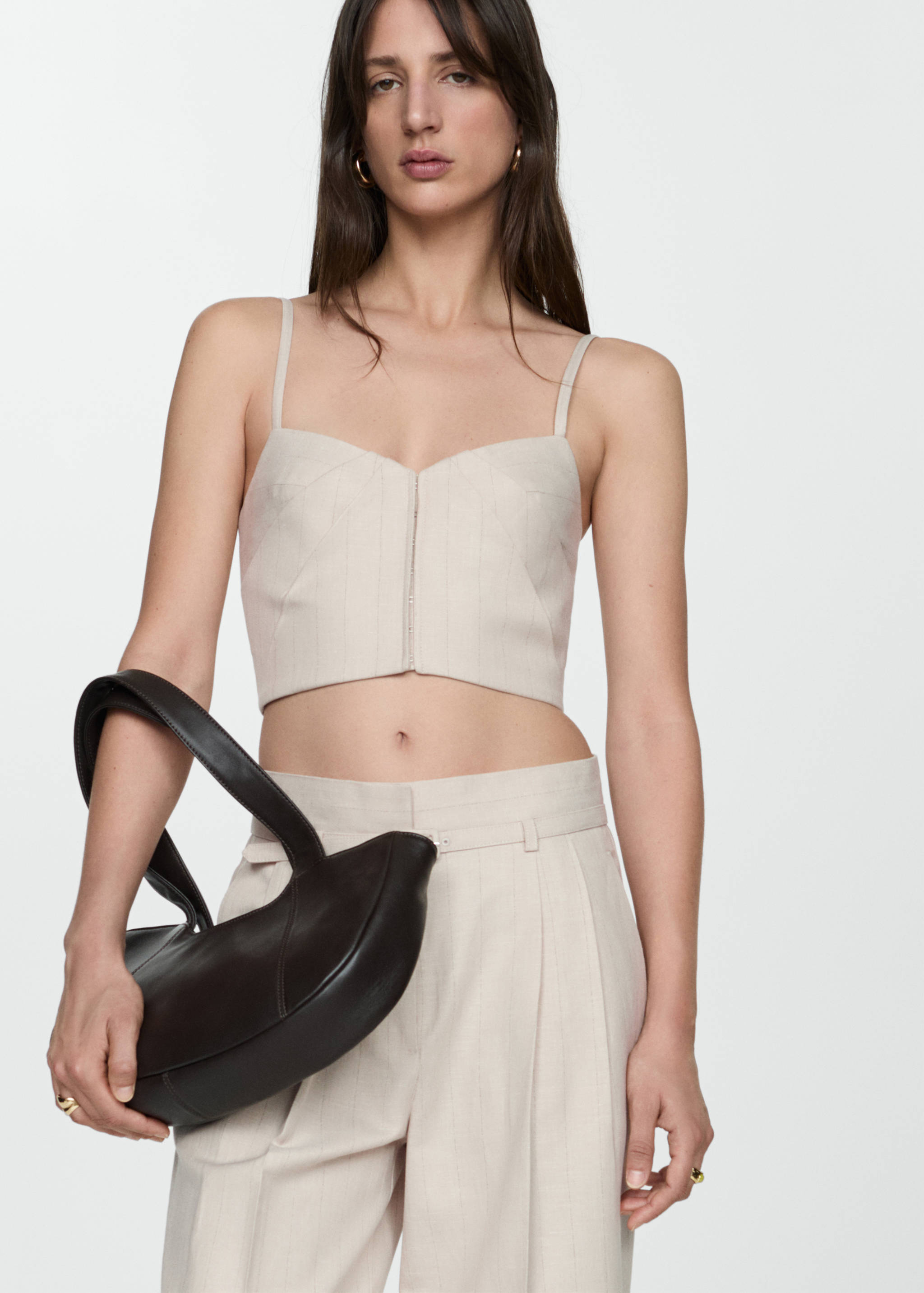 Calças de fato de pinças com cinto - Pormenor do artigo 1