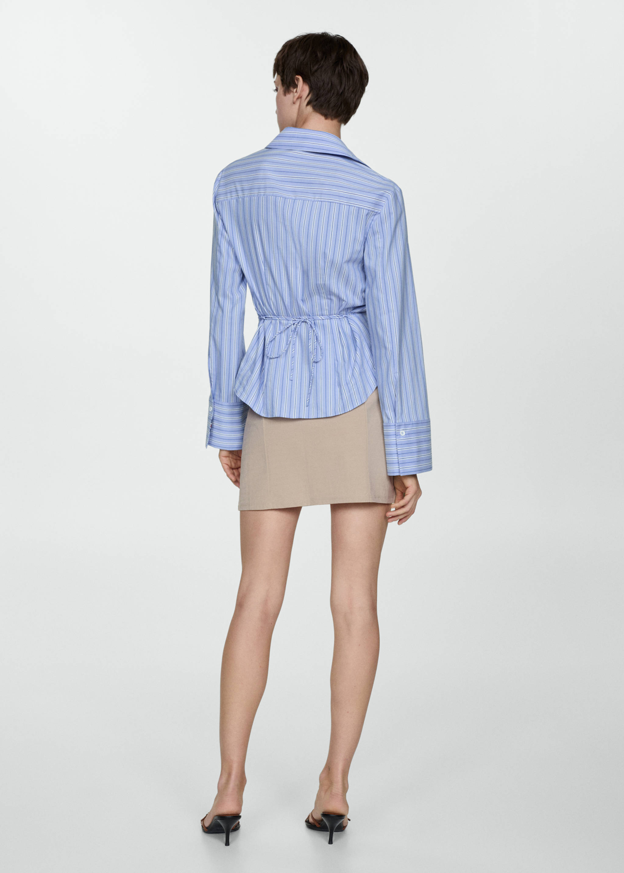 Double-belt mini-skirt - Reverse of the article