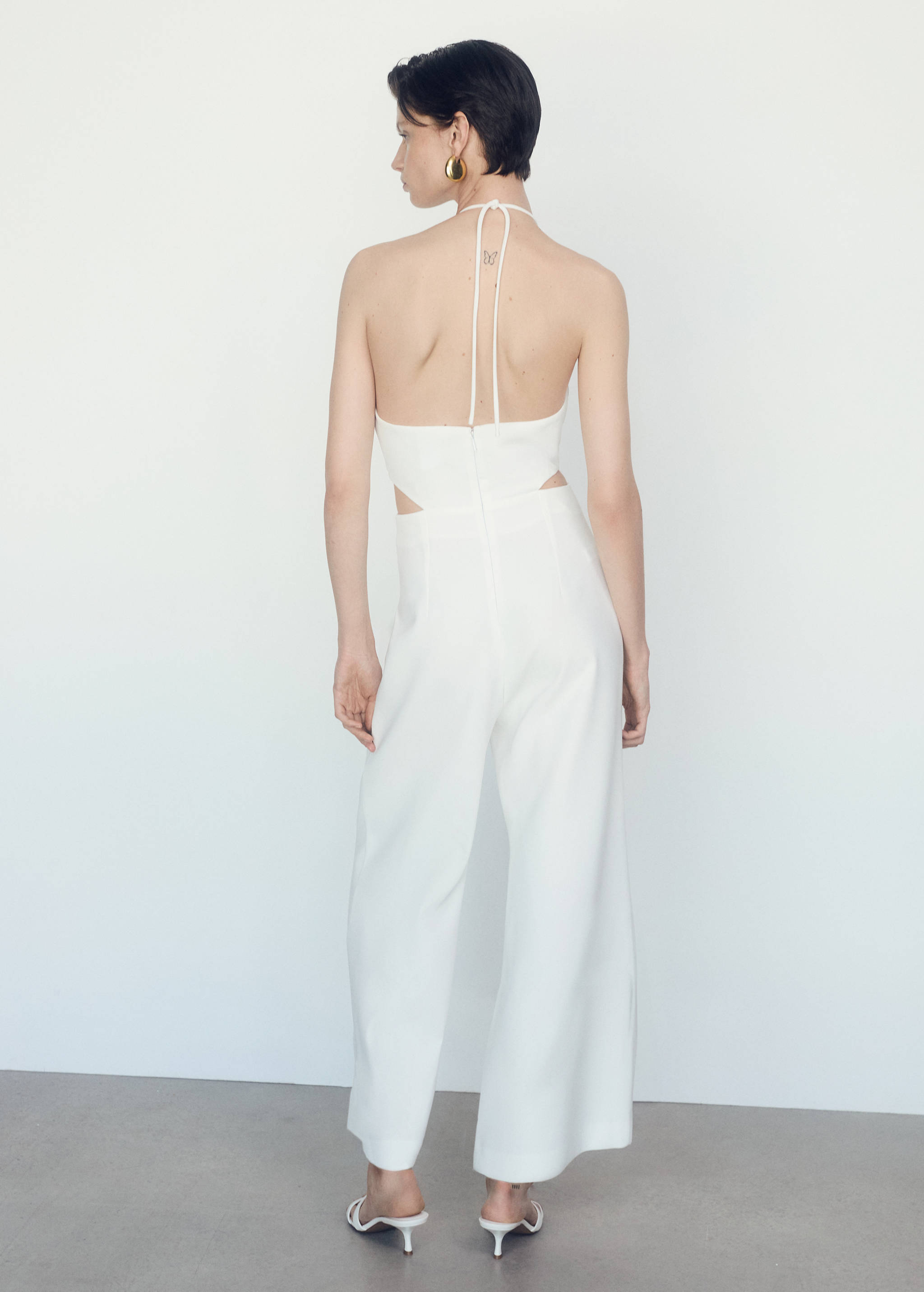 Halter-neck jumpsuit with slits - Reverse of the article