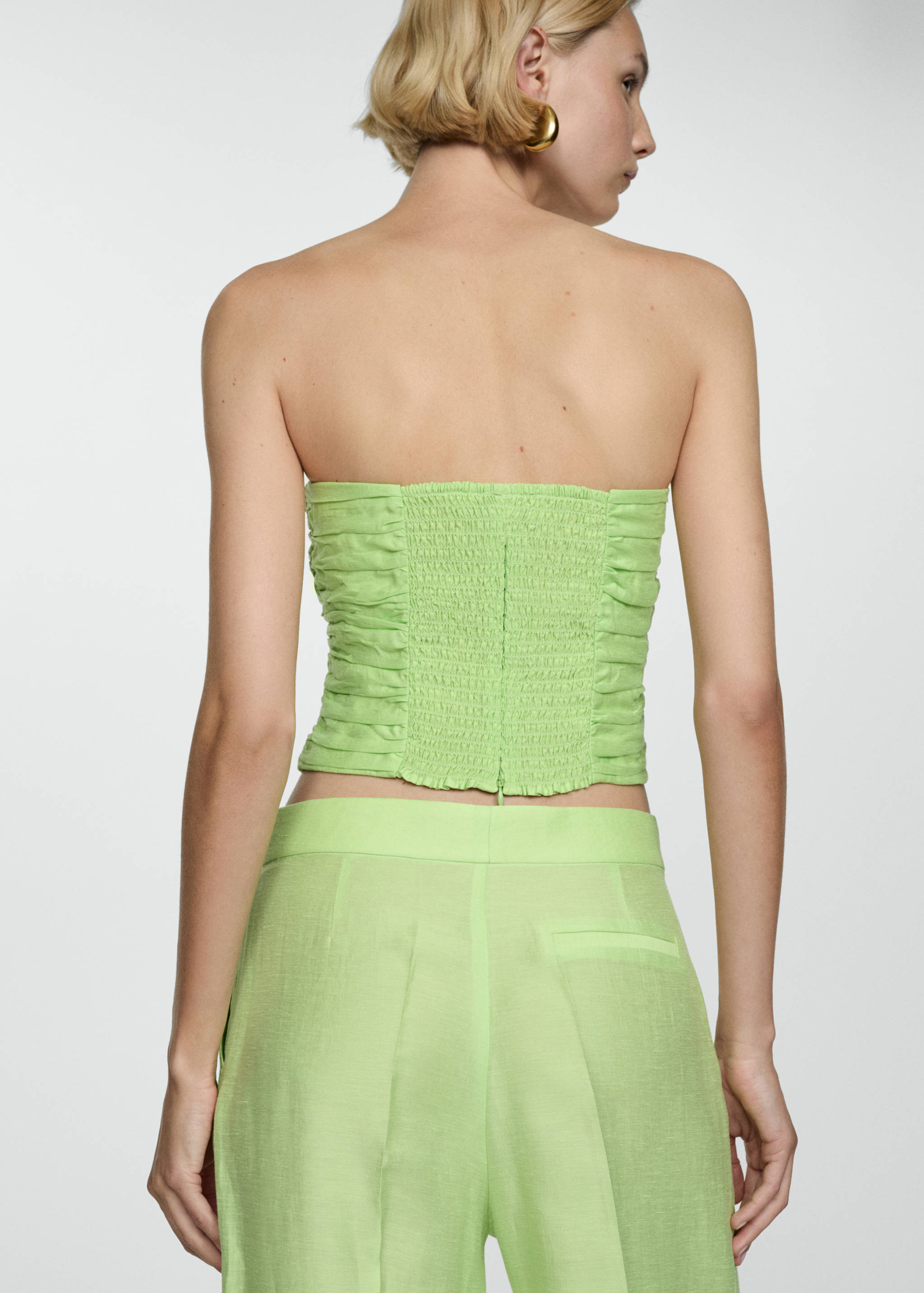 Top crop drapeado - Reverso del artículo