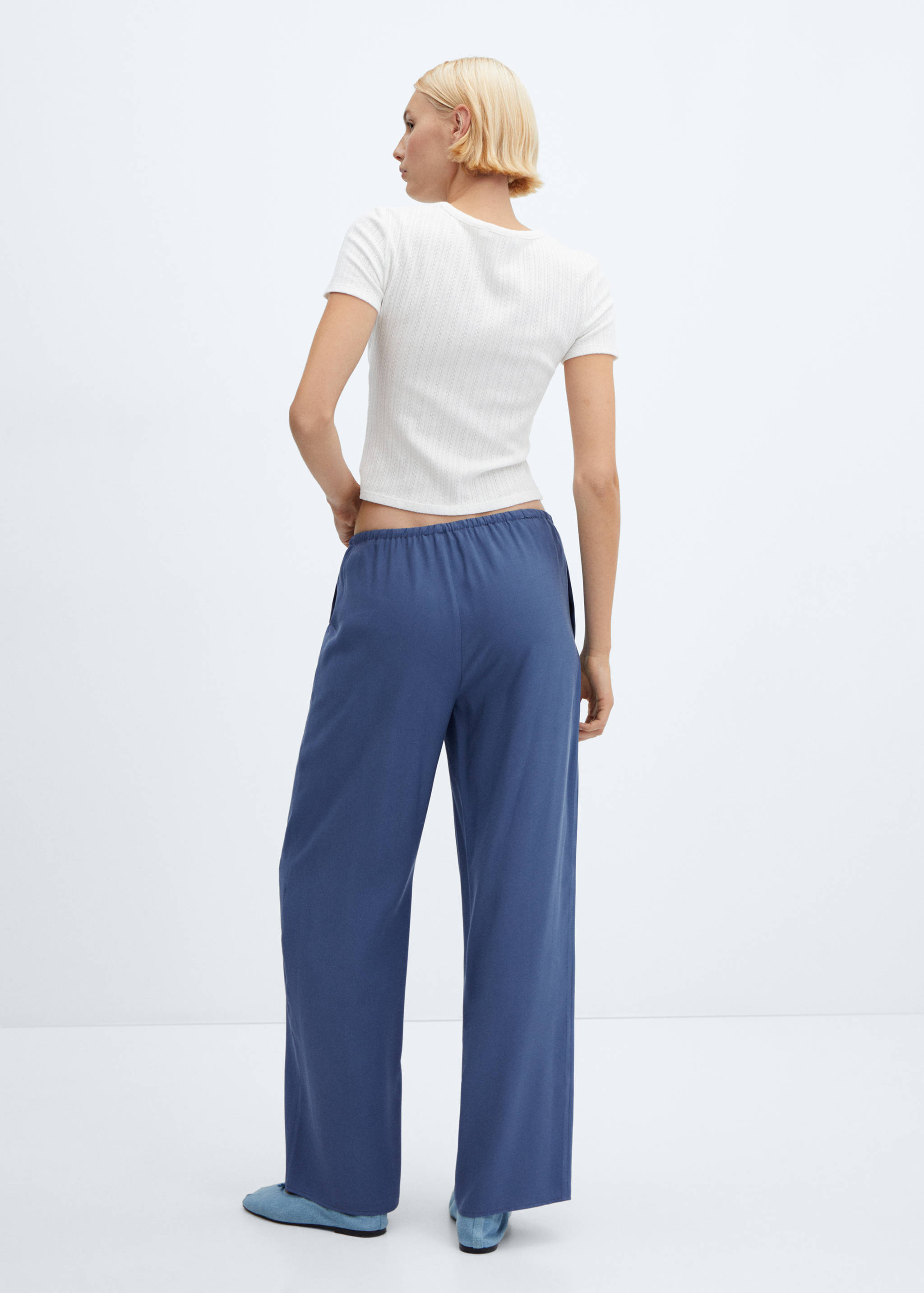 Wide leg trousers with elastic waist - Reverse of the article