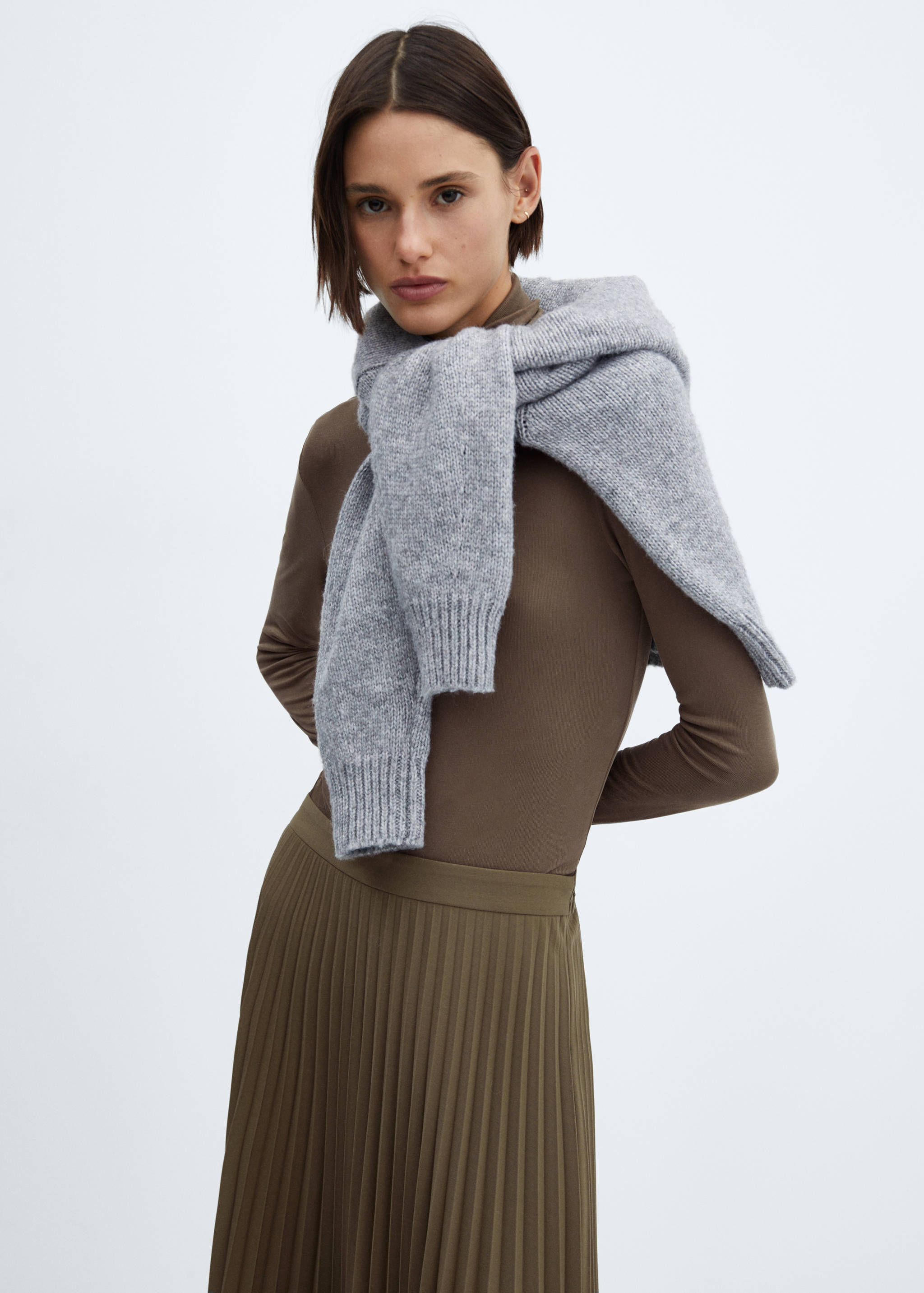 Lange plissérok - Detail van het artikel 1