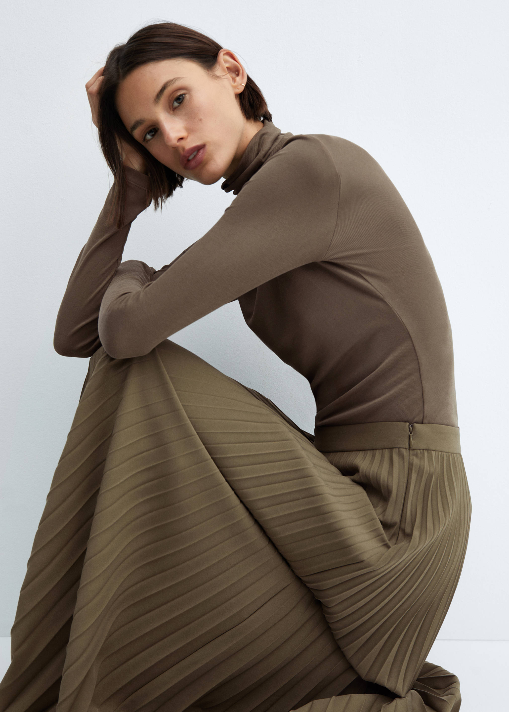 Lange plissérok - Detail van het artikel 2