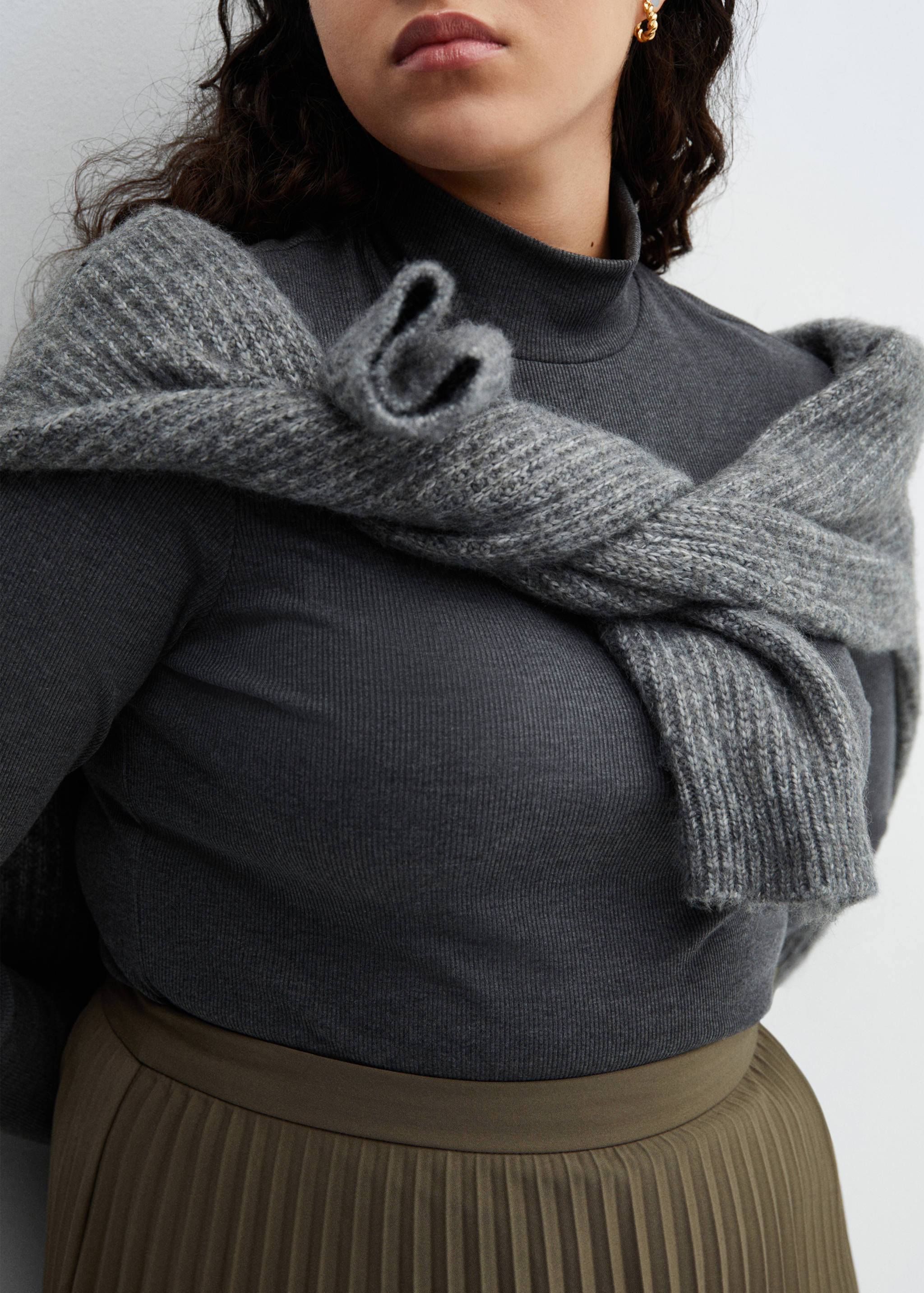 Lange plissérok - Detail van het artikel 4