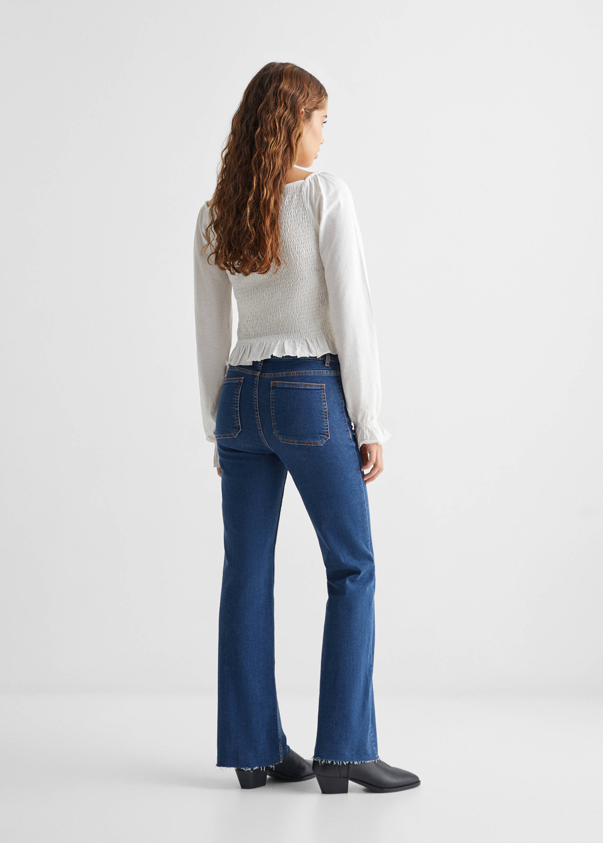 Flared Jeans mit Taschen - Rückseite des Artikels