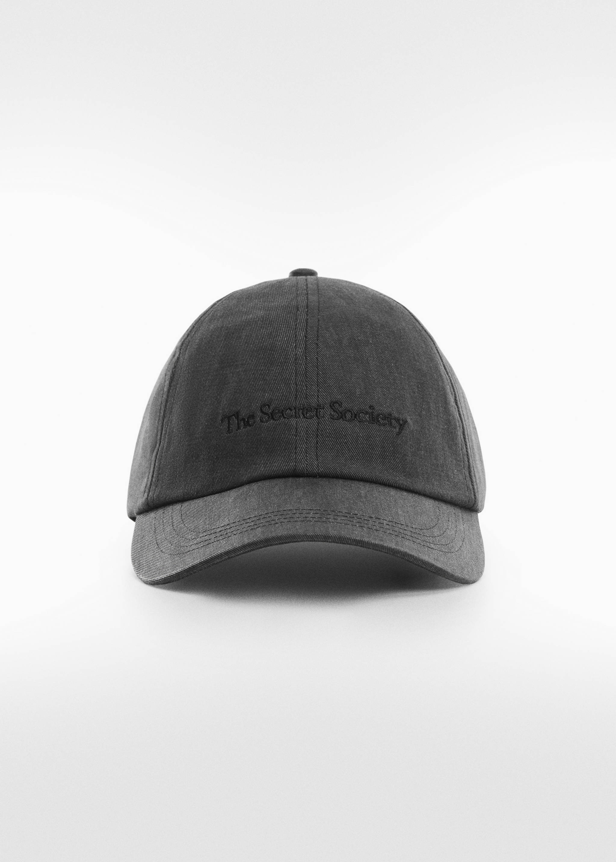 Denimkeps text - Bild av mittparti