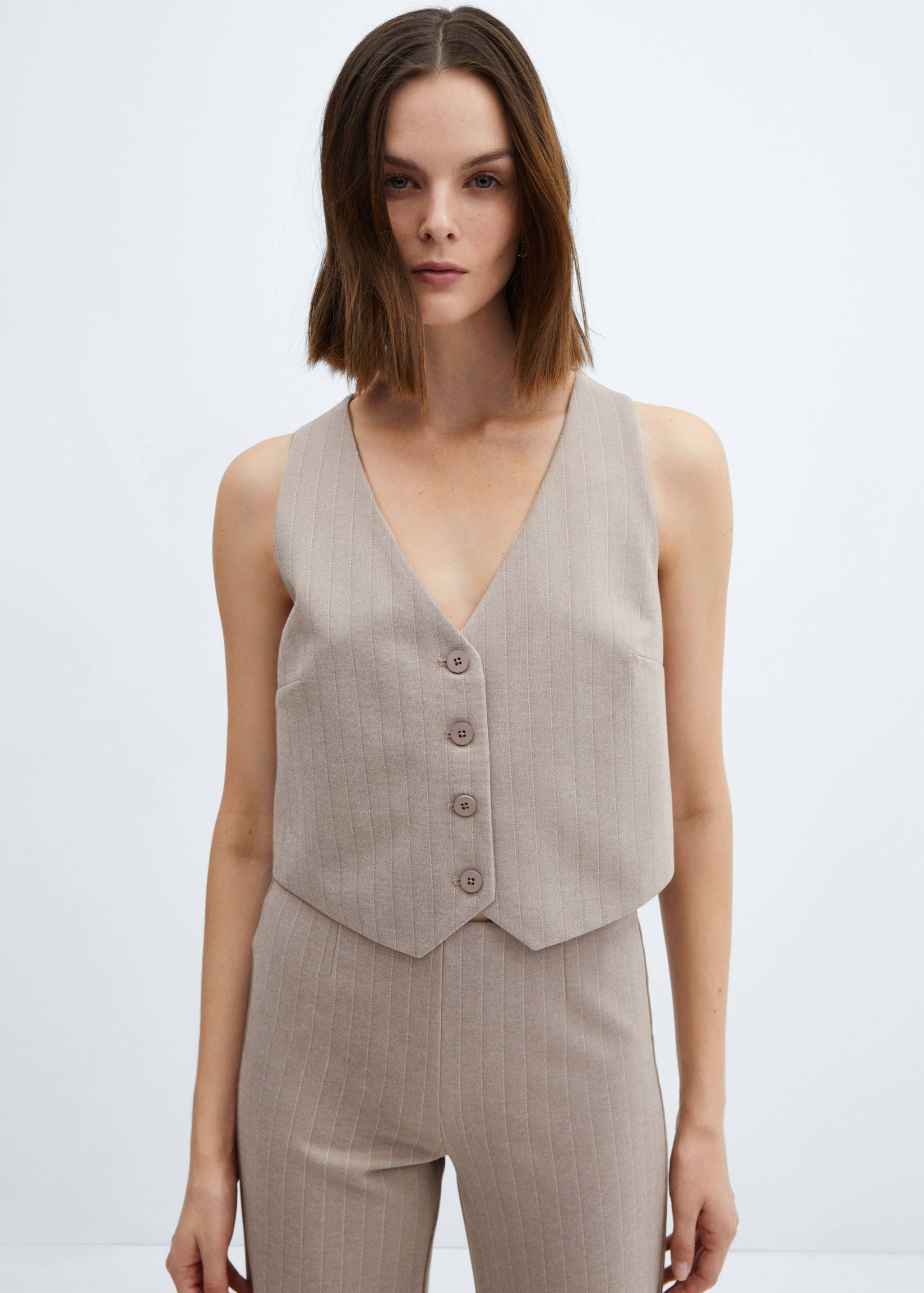 Väst med knappar - Bild av mittparti