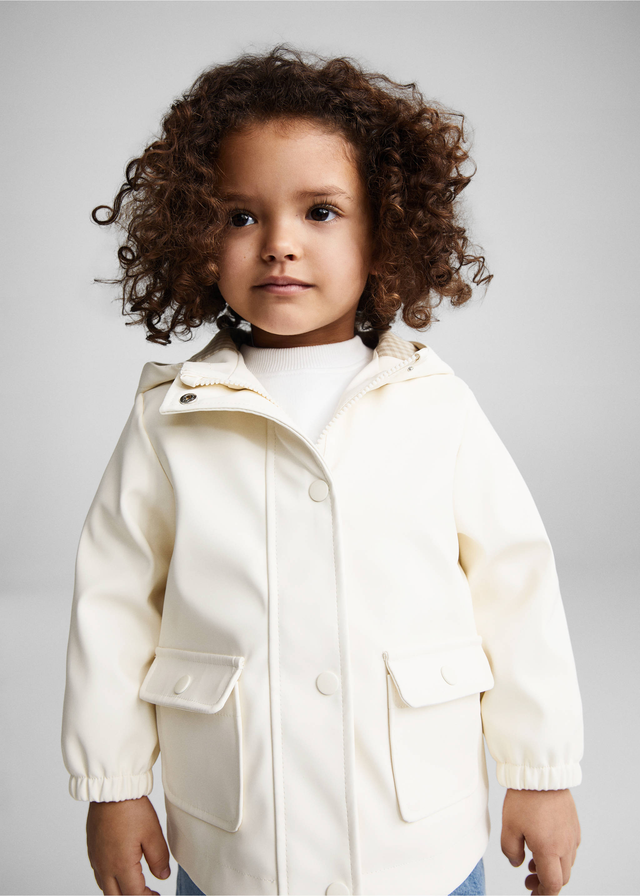 Raincoat hooded jacket - Details of the article 1, Ecru. Ref: 67084449-00.