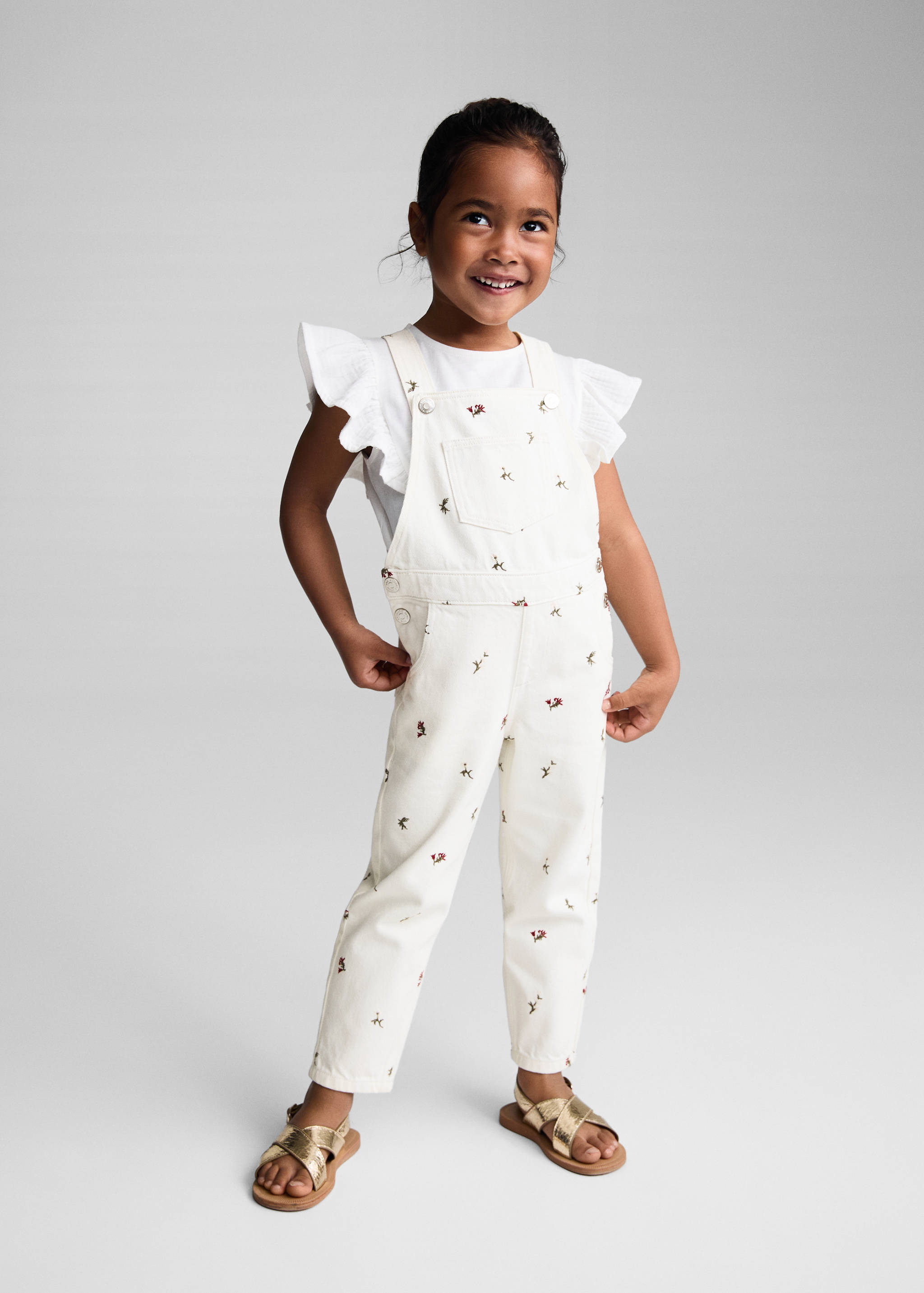 Broderade hängselbyxor i denim - Allmän bild