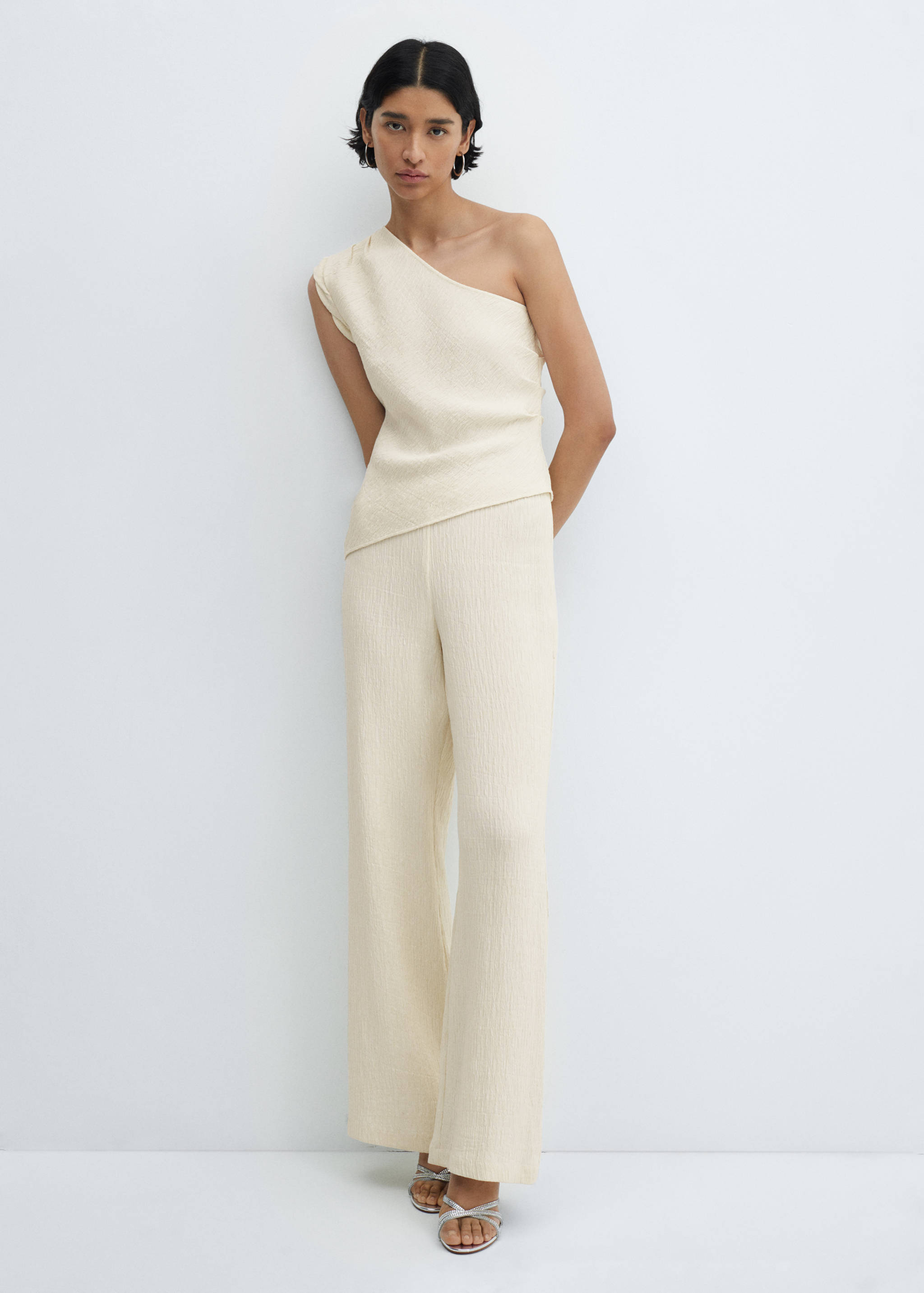 Asymmetrical textured top - General plane