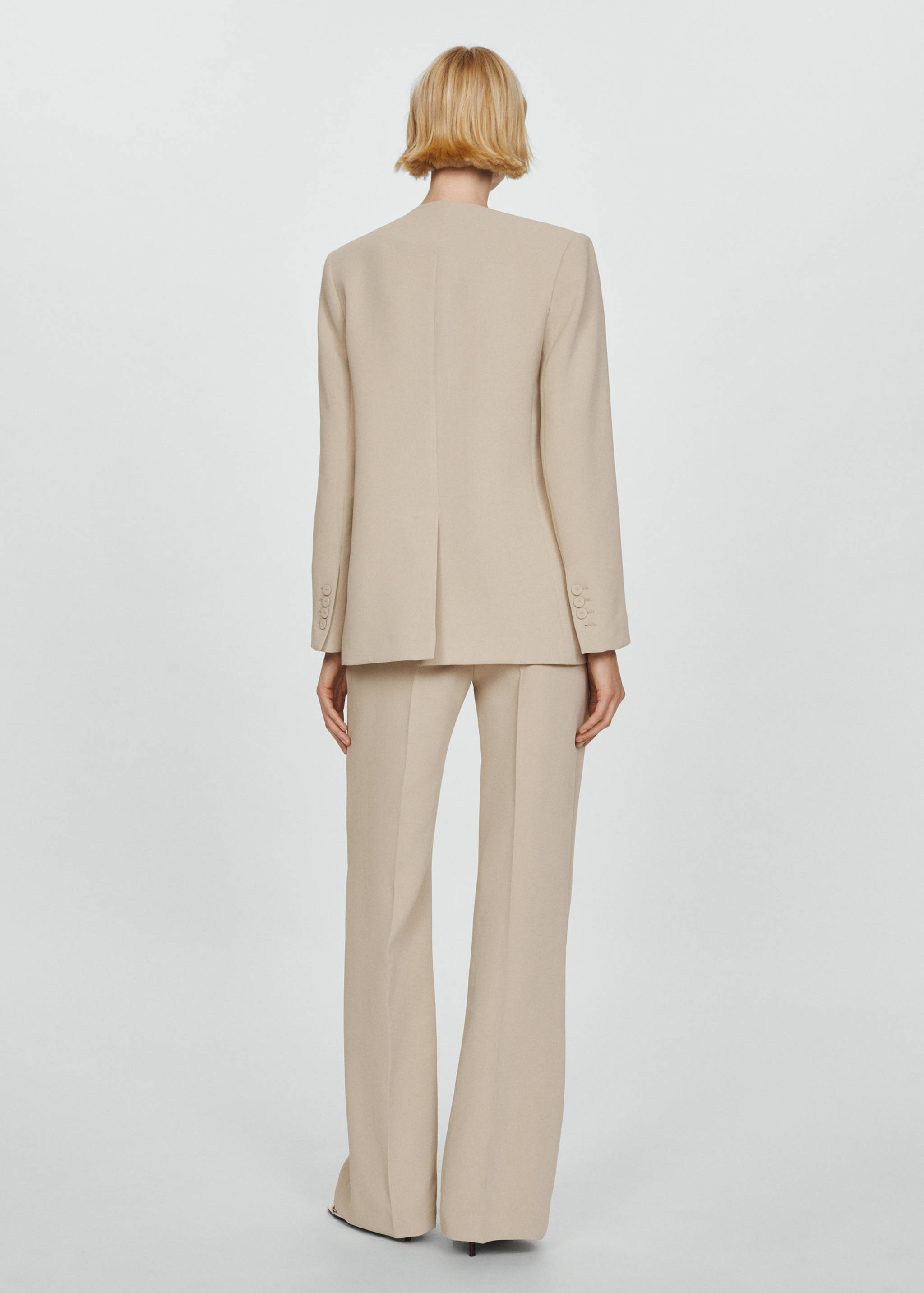 Americana traje estructura - Reverso del artículo