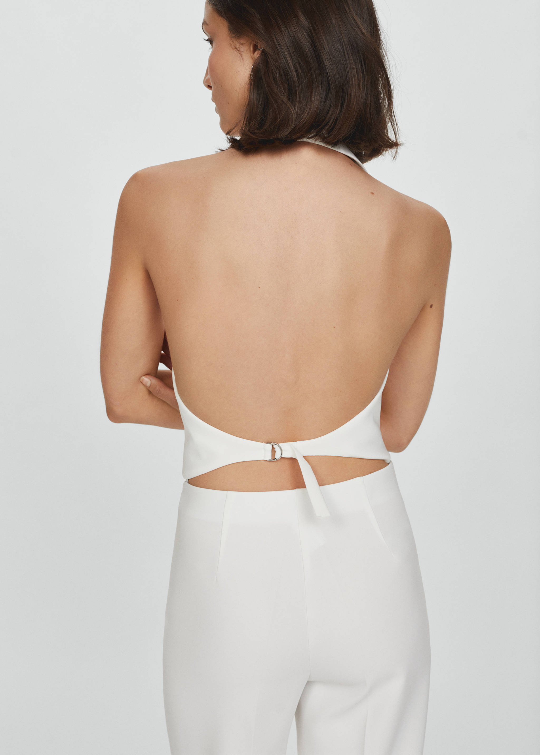 Colete de fato com botões - Verso do artigo