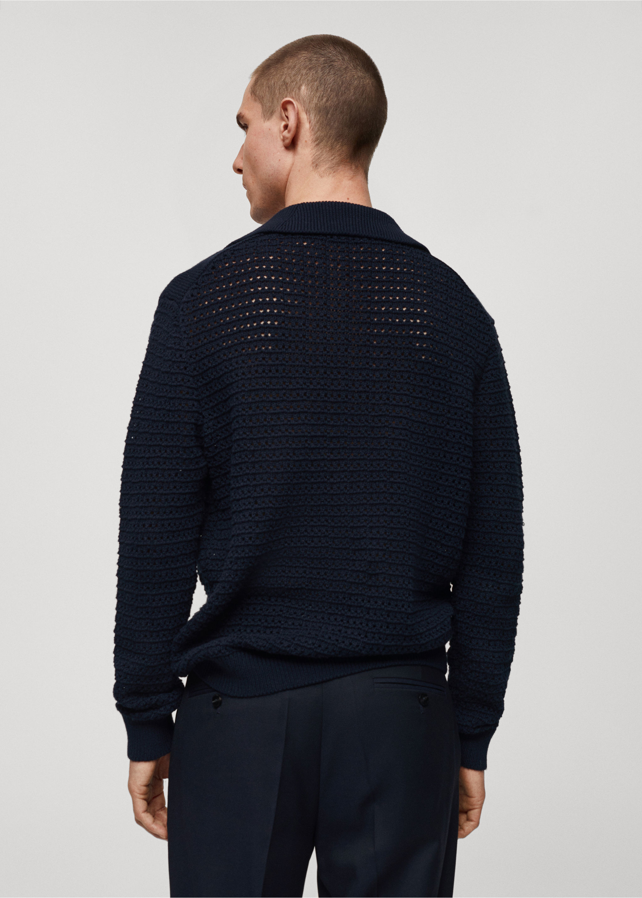 Openwork knitted polo-neck sweater - Reverse of the article