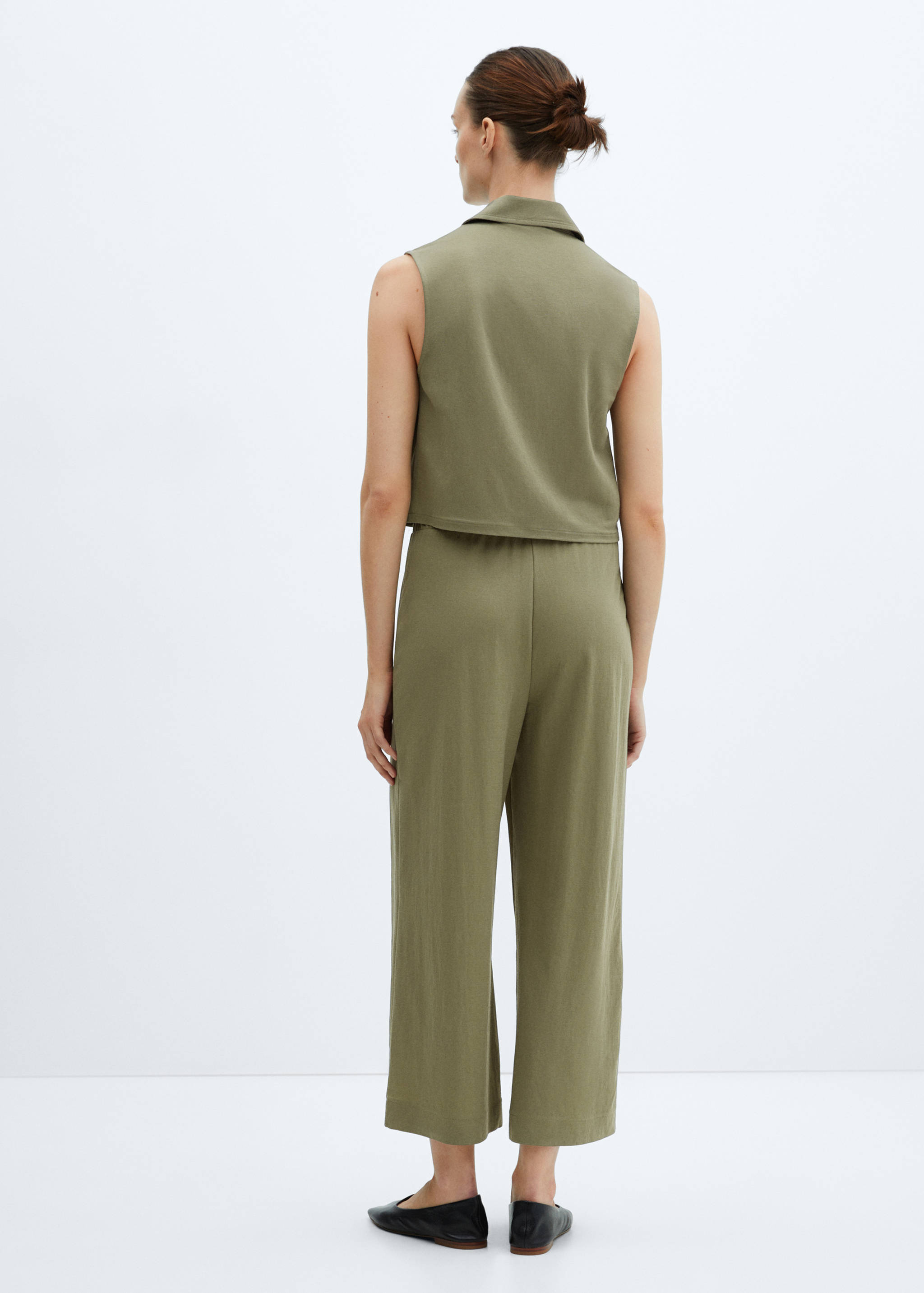 Shirt-collar vest - Reverse of the article