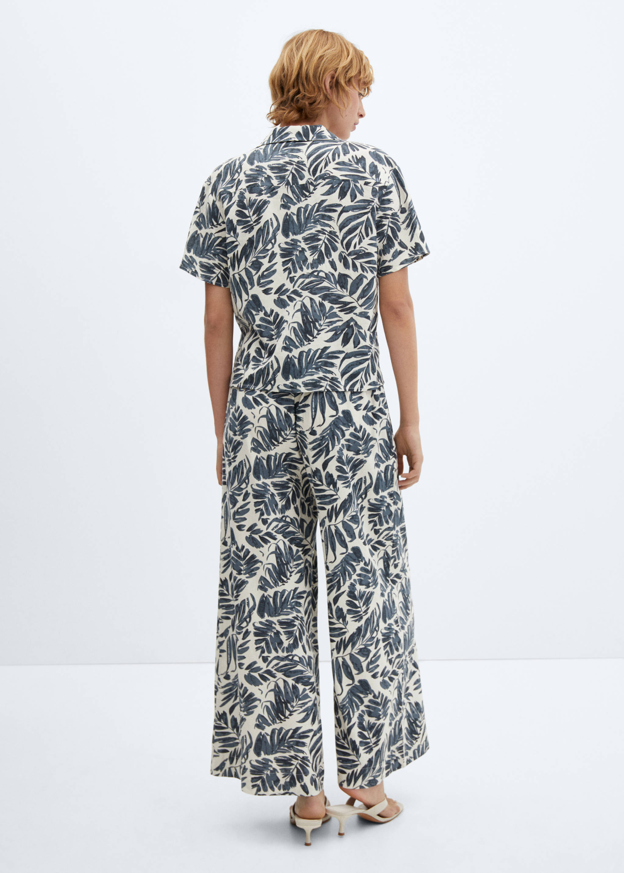 Tropical-print linen pants - Reverse of the article