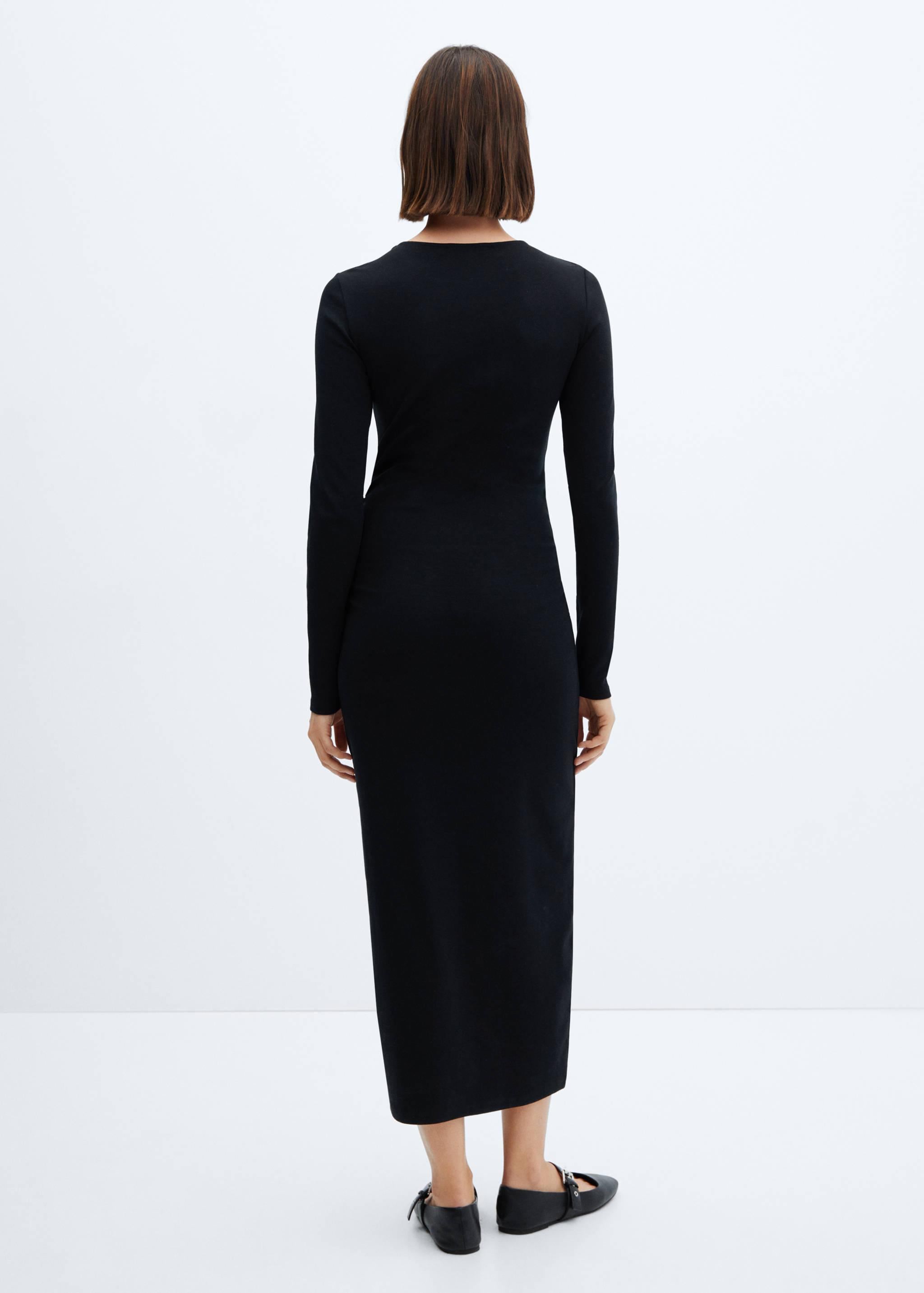 Klänning rynkade detaljer i sidan - Artikelns baksida