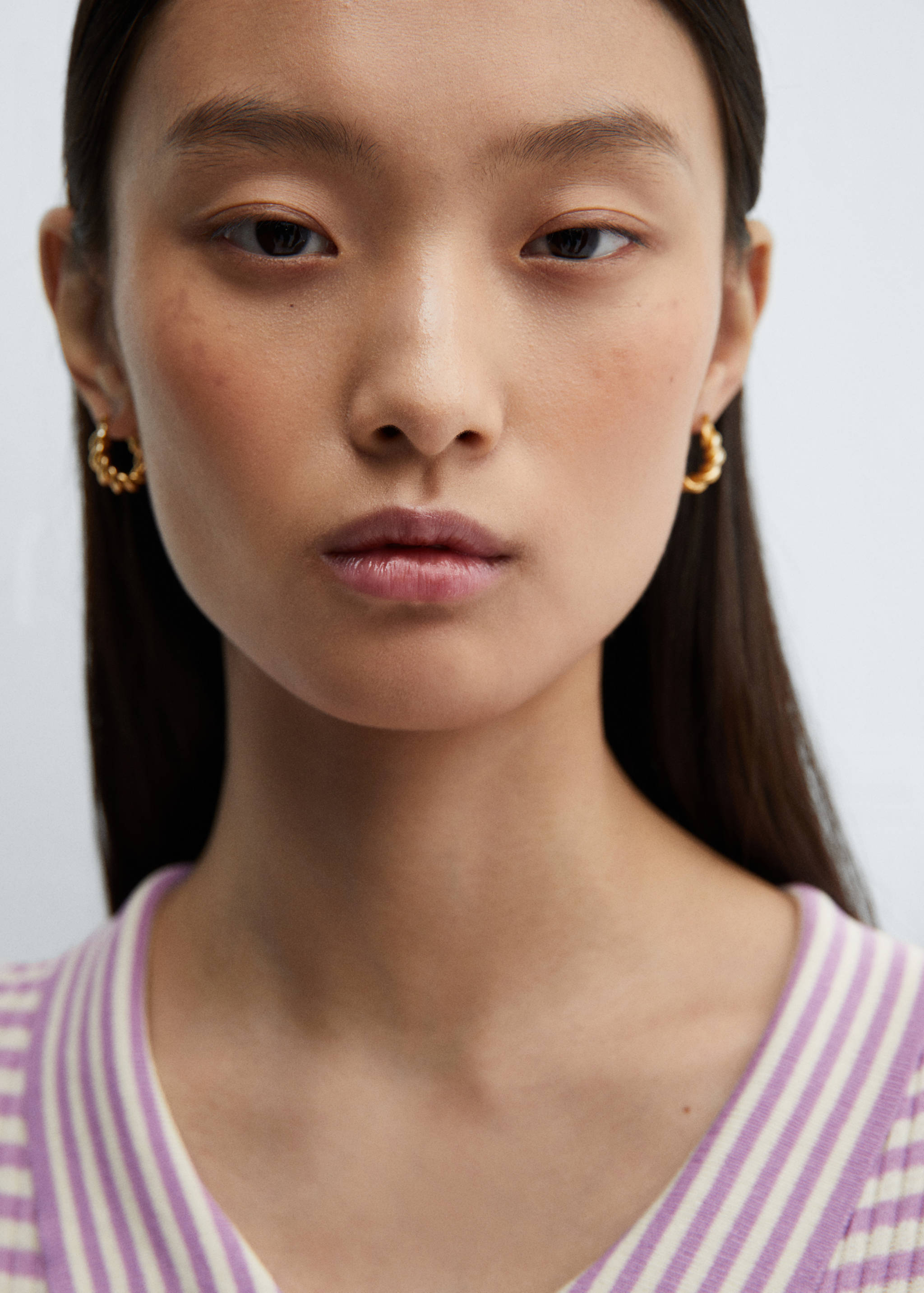 Gestreiftes Poloshirt mit Reißverschluss - Detail des Artikels 1