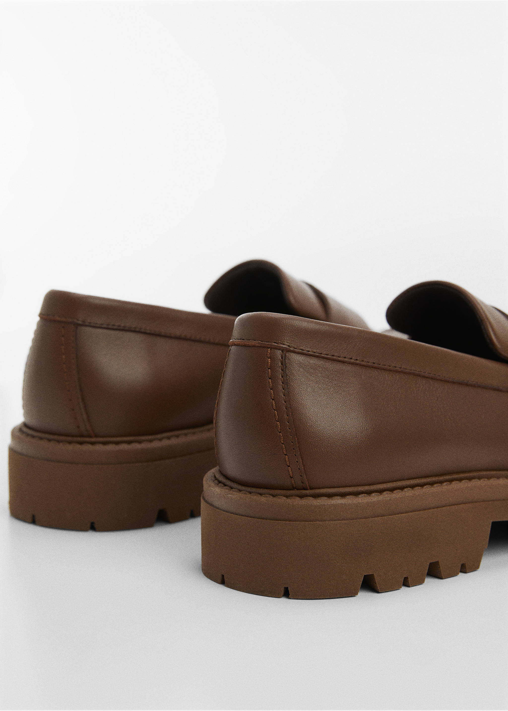 Leather moccasin with track sole - Details of the article 1, Chocolate. Ref: 67094470-00.