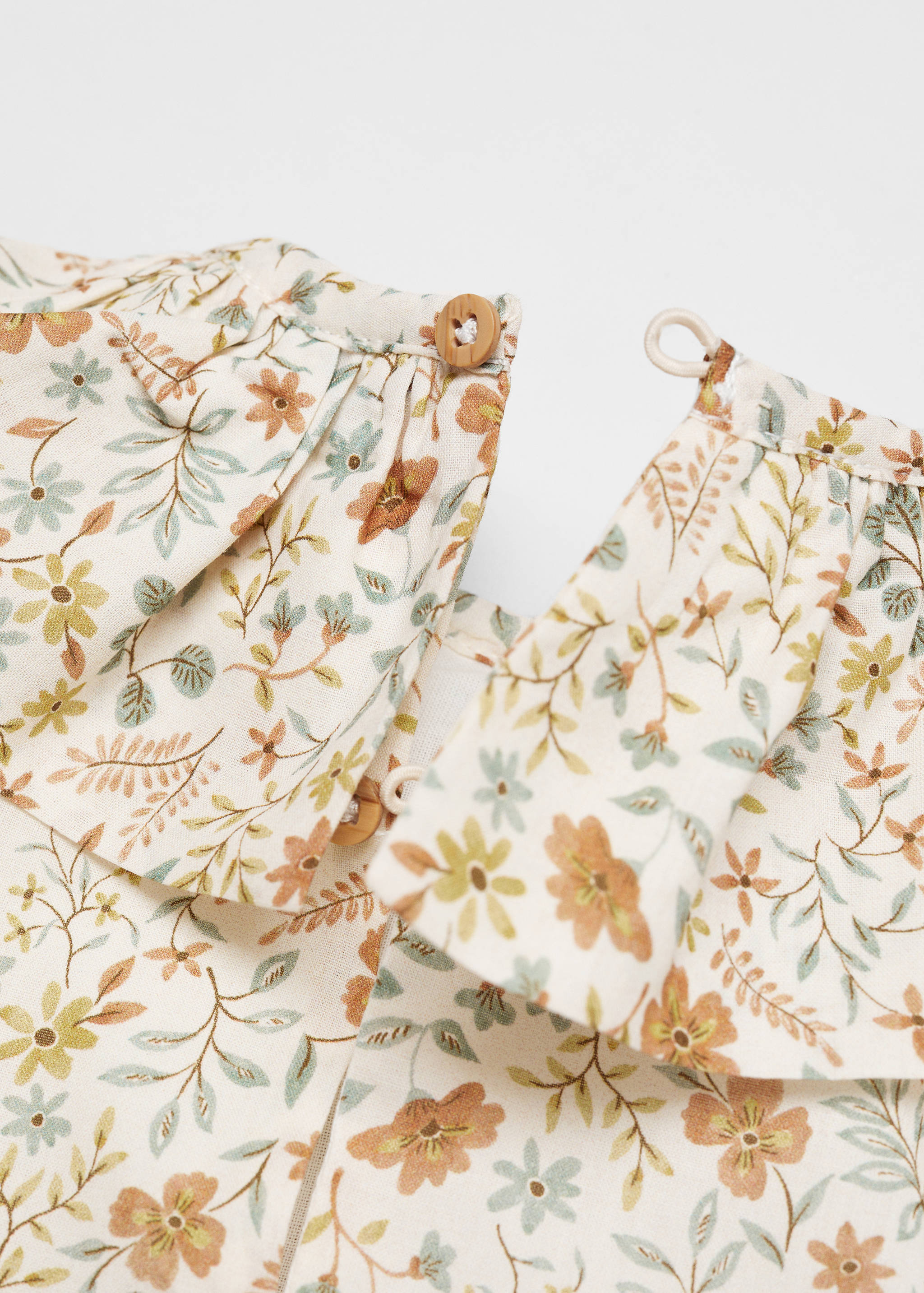 Kleid mit Blumendruck - Detail des Artikels 8