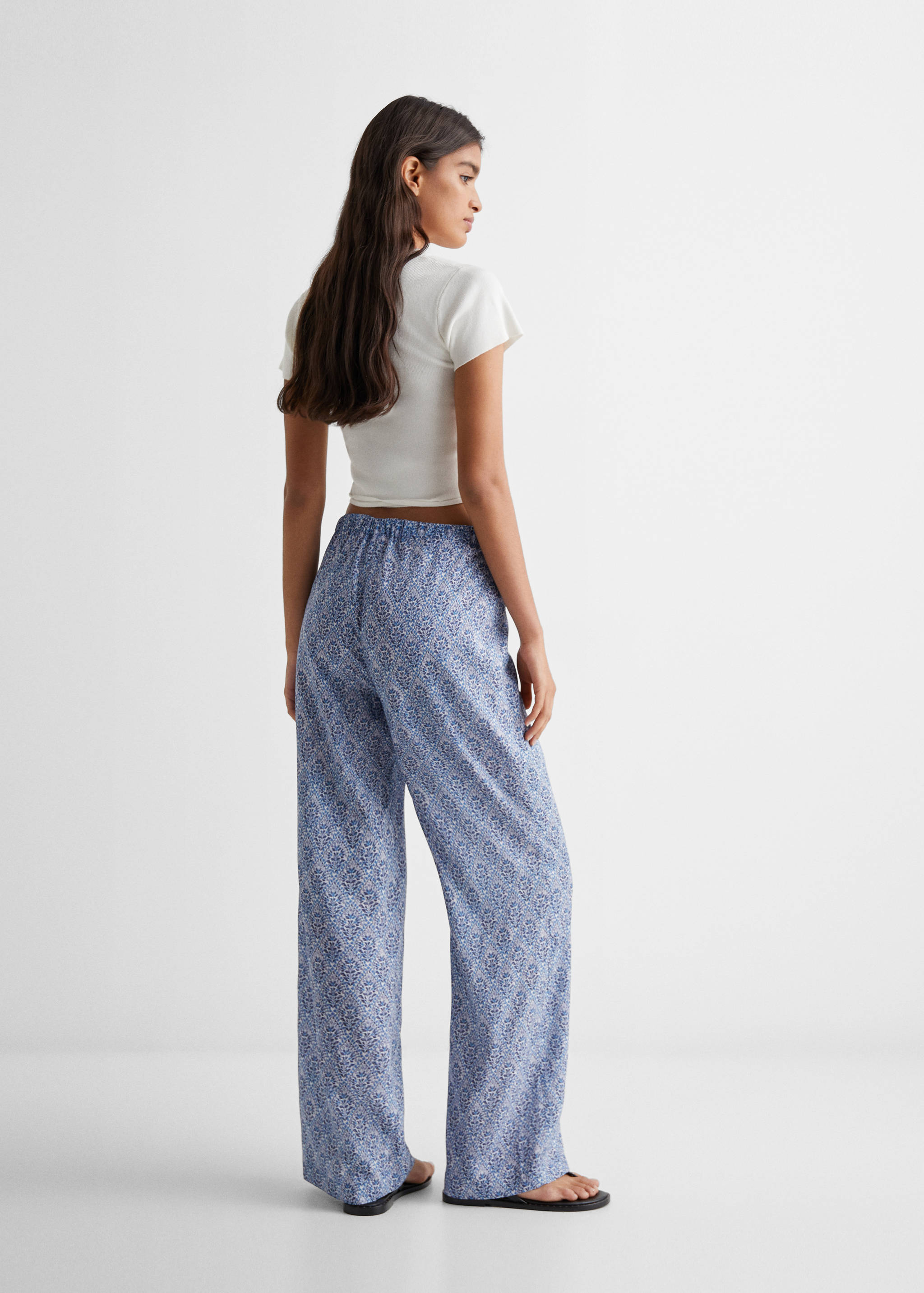 Printed trousers with bow - Reverse of the article
