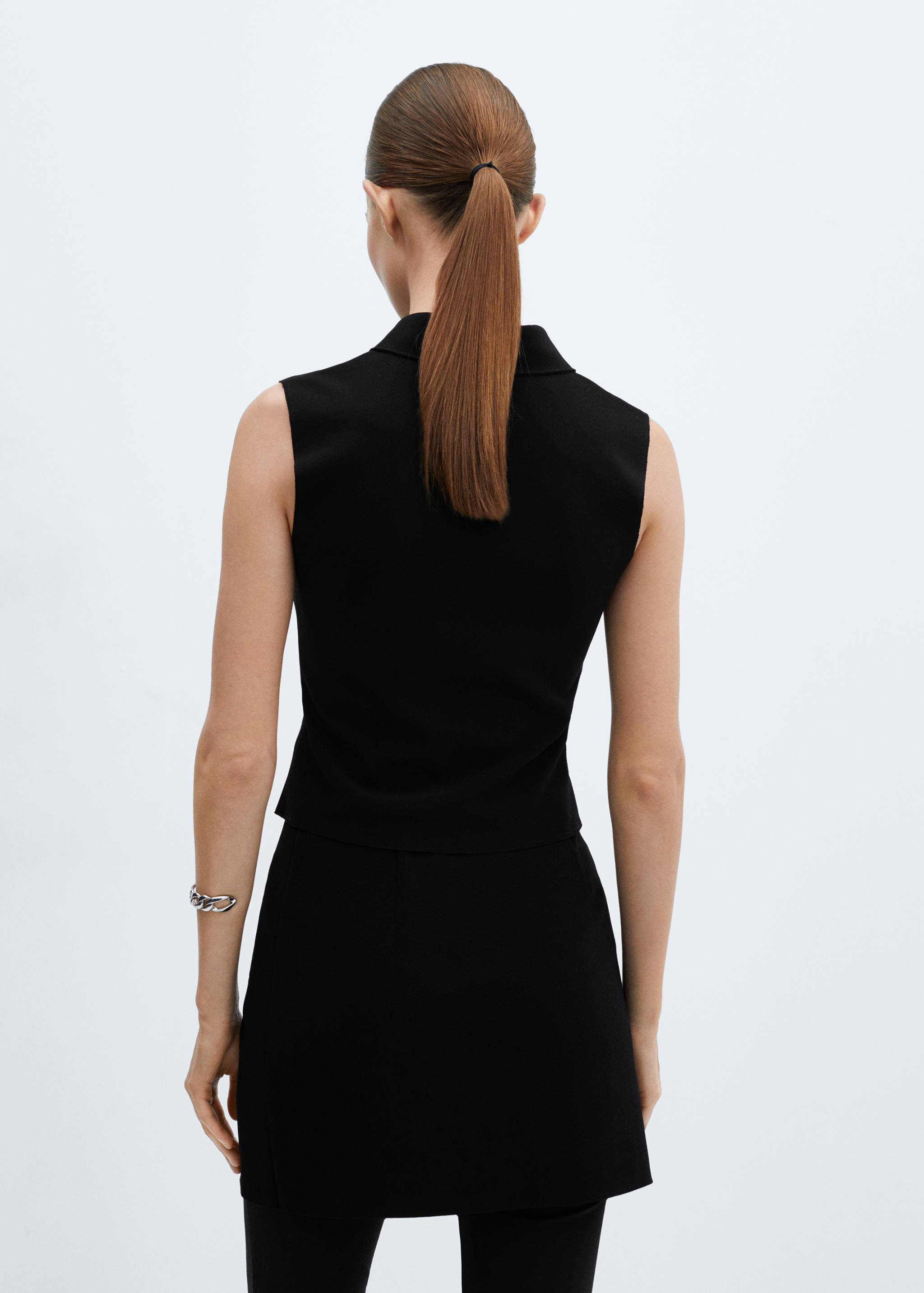 Top crop cremallera - Reverso del artículo