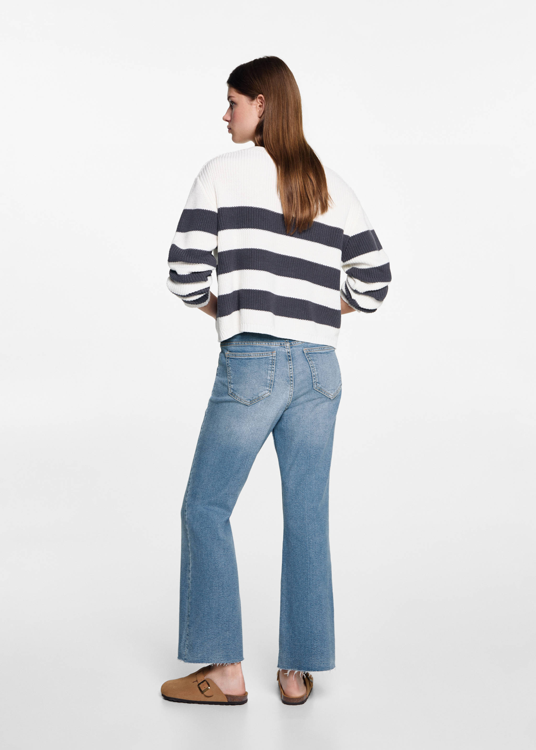 Flared finished jeans - Reverse of the article