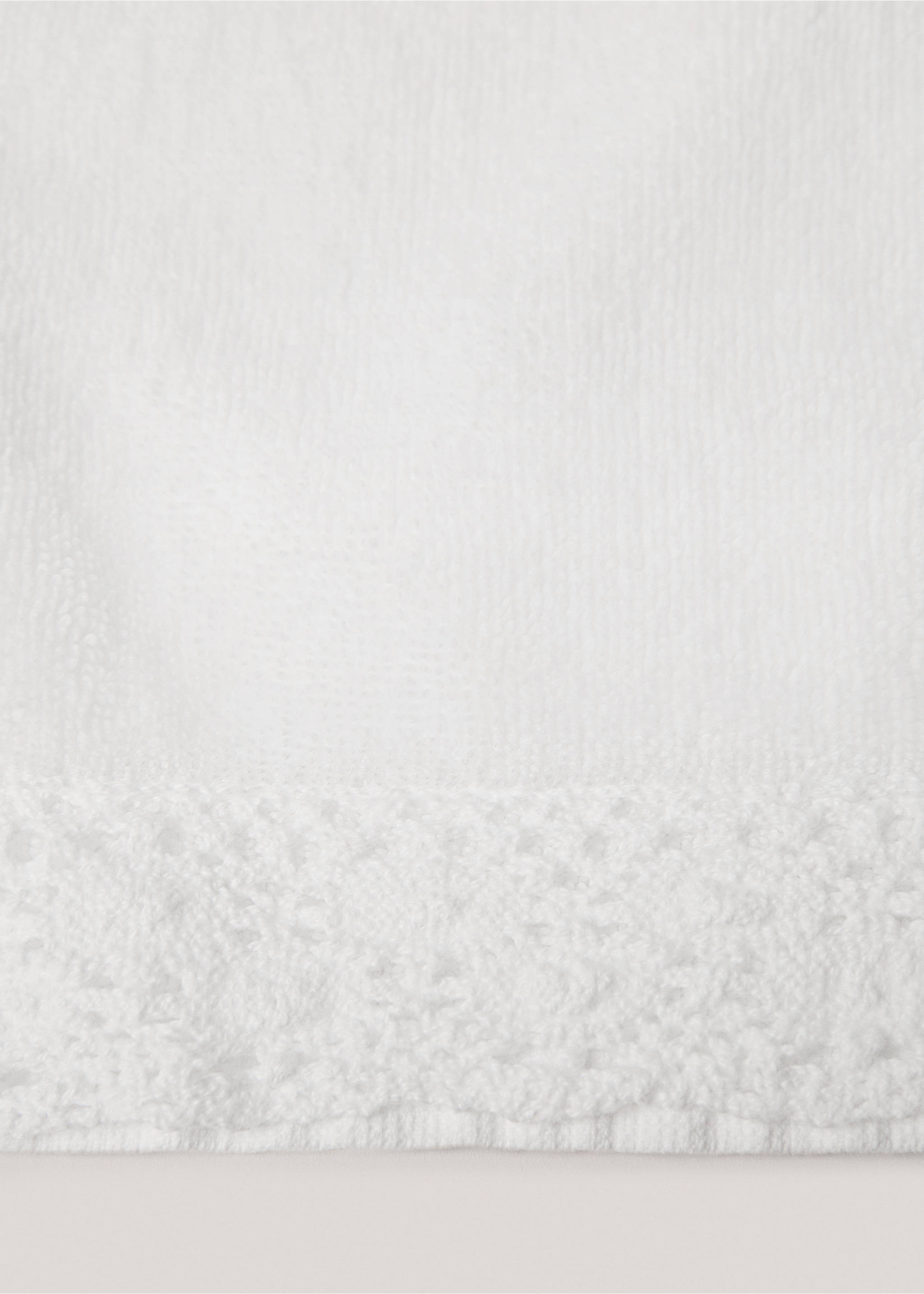 Face towel with crochet detail 30x50cm - Details of the article 1, White. Ref: 77000652-00.