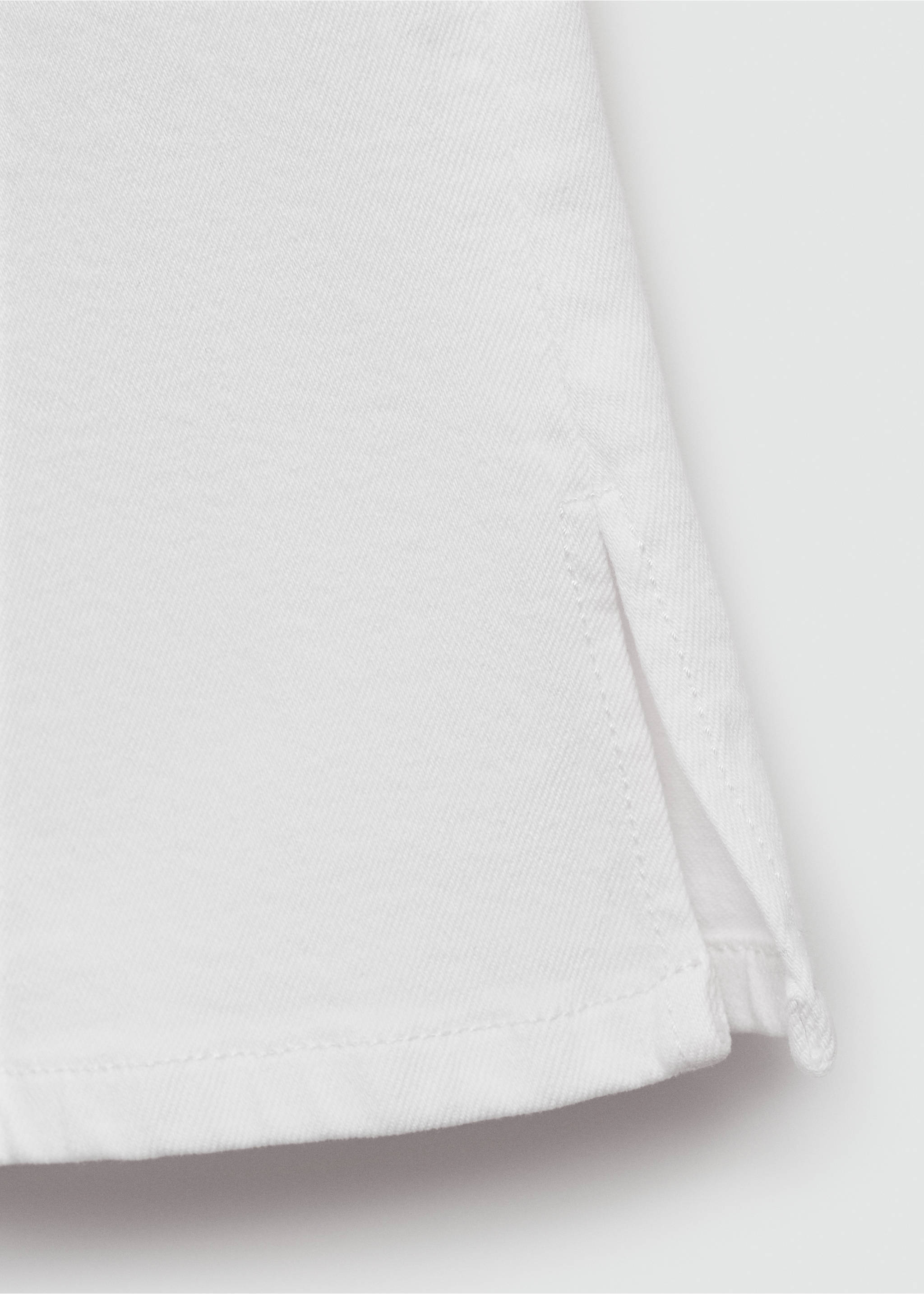 Flared Jeans mit Schlitz - Detail des Artikels 8, Weiß. Ref: 77001013-00.